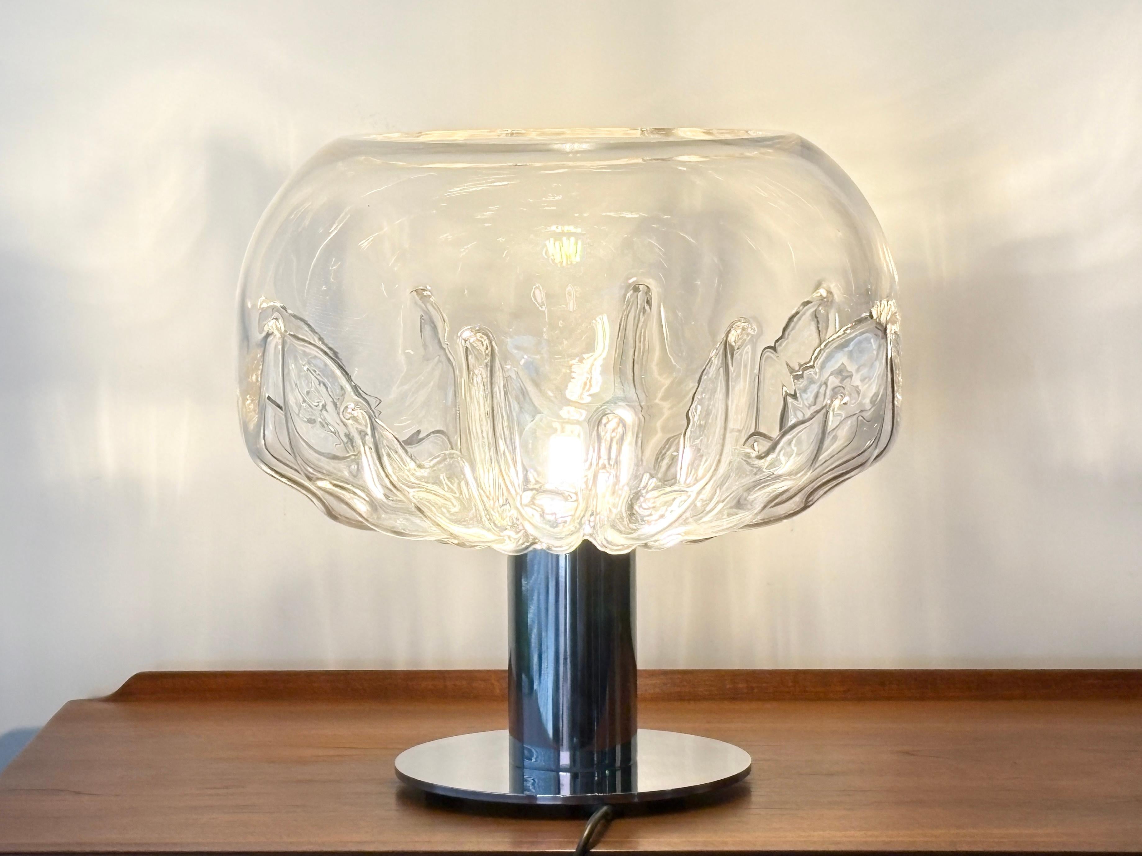 Murano glass table lamp designed by Toni Zuccheri for VeArt, ca. 1973

When it comes to Murano glass lighting, Tobi Zuccheri is one of the designers you will definitely come across. 
Zuccheri studied at the Venice architecture faculty where he