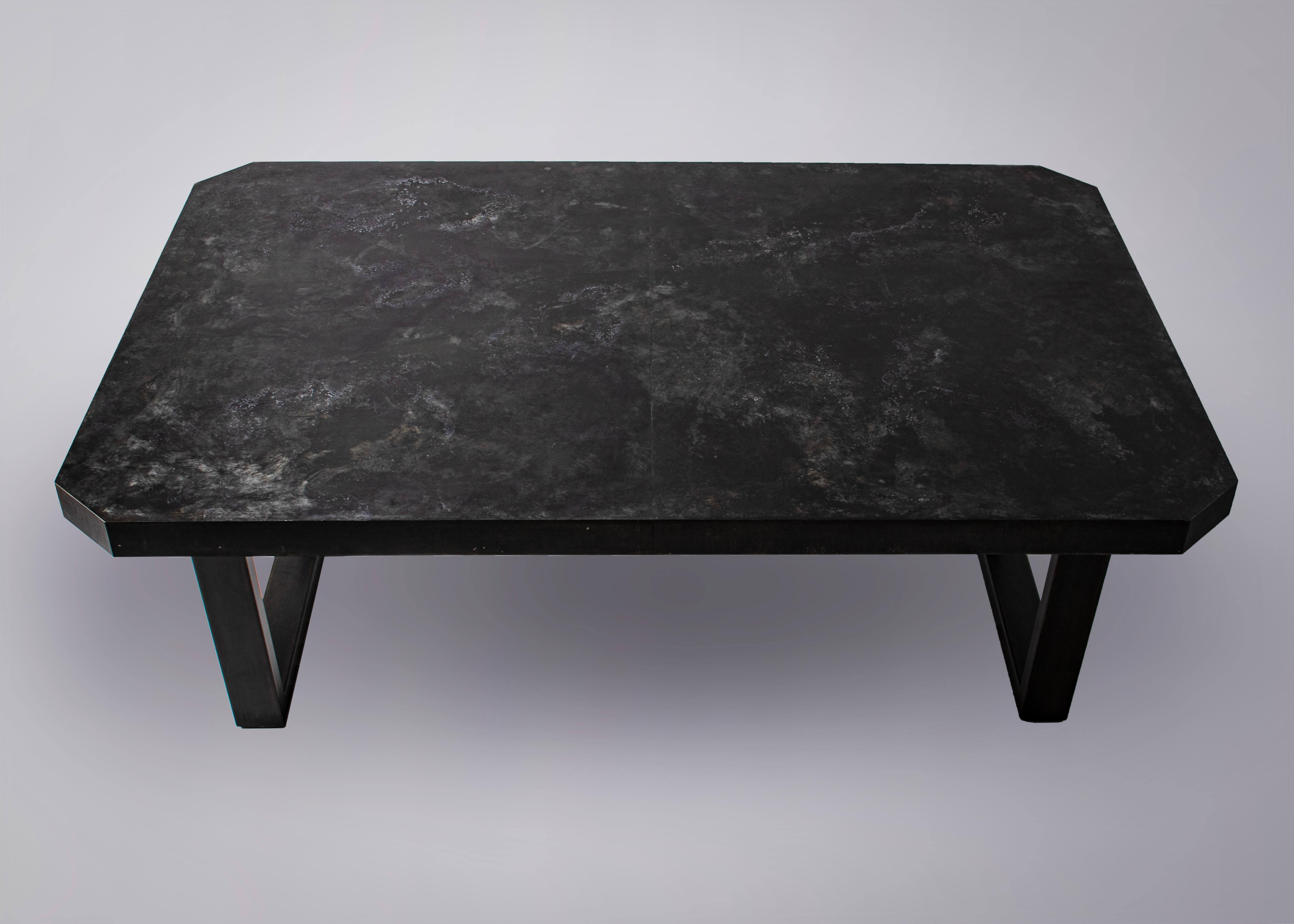 Custom distressed dark zink octogon shaped dining table with black hollow steel base.

Designed by Brendan Bass for the Vision and Design Collection, by using high quality materials and textures. All materials are sourced from local vendors