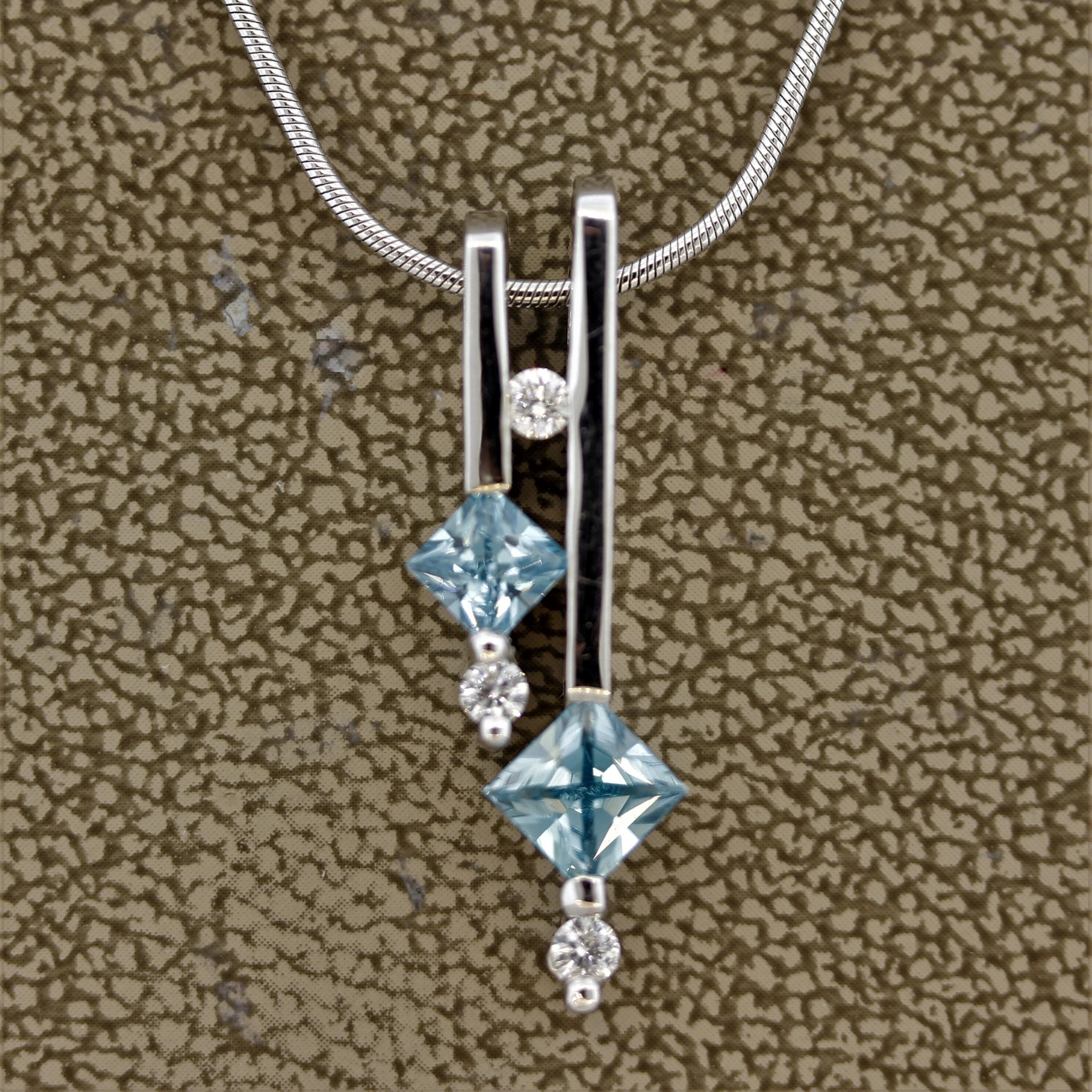 Zircon is an underappreciated fine and natural gemstone with the same brilliance and brightness of a diamond! This pendant features 2 square cut blue zircons weighing 1.32 carats along with 3 round brilliant cut diamonds weighing 0.14 carats. Made
