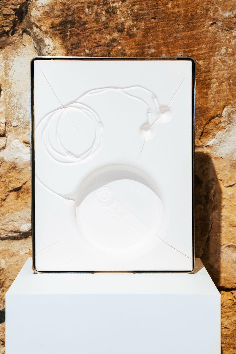 TRACE continues Scutts’s exploration of typography, materiality,
and memory through experimental ceramic and glass processes.
Using her unique vacuum forming method of plaster casting, she
creates delicate, skin-like distortions. The resulting