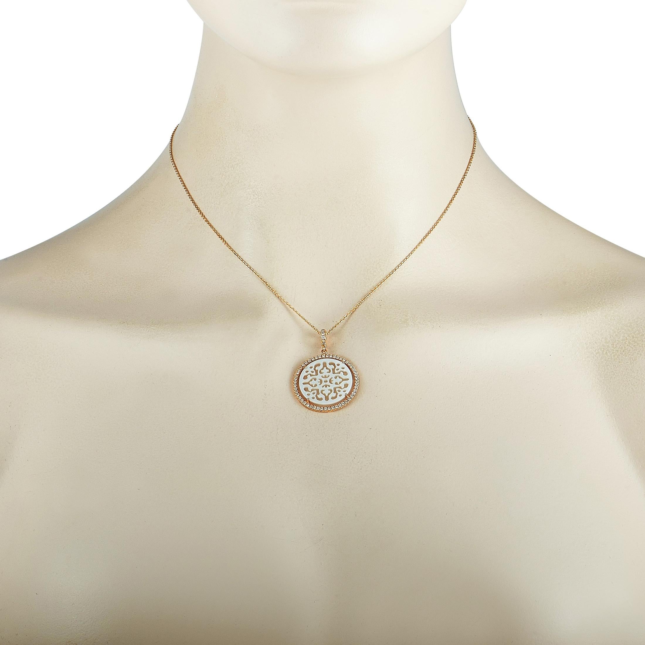 This Zoccai necklace is made of 18K rose gold and weighs 5.1 grams. It is presented with a 16” chain onto which a 1.25” by 1” pendant is attached. The necklace is embellished with mother of pearl and a total of 0.46 carats of diamonds.
 
 Offered in