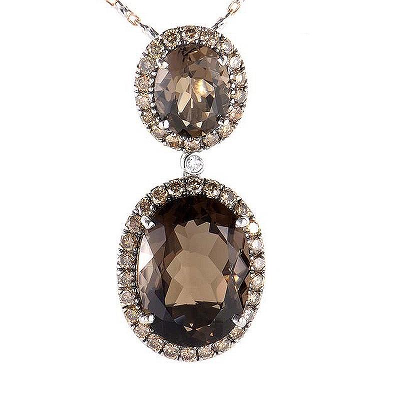 This pendant necklace from Zoccai is gorgeous and refined. It is made of 18K white and rose gold and boasts a design of ~11.60ct of smokey topaz stones accented with ~1.32ct of cognac diamonds.