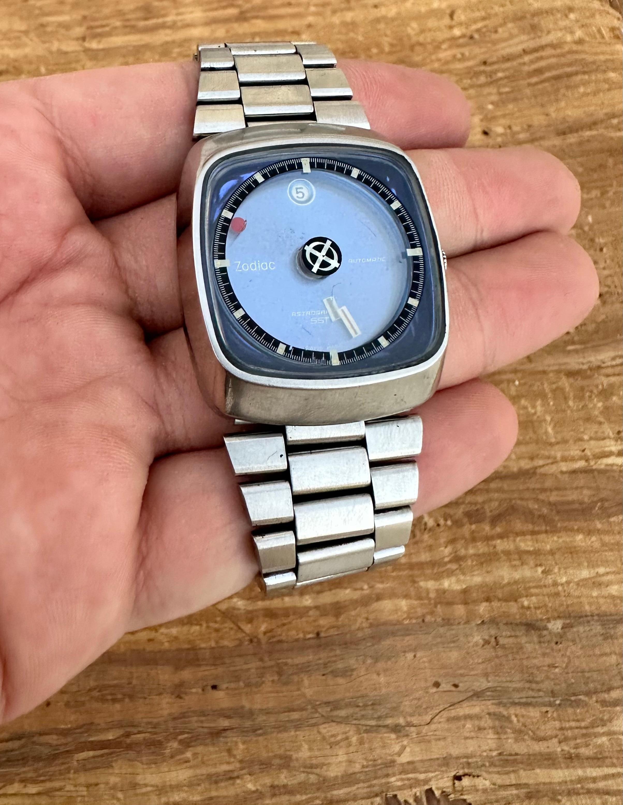 Brand: Zodiac

Model: Astrographic SST

Reference Number: 882-963

Country Of Manufacture: Switzerland

Movement: Automatic

Case Material: Stainless steel

Measurements : 34mm (without crown)

Band Type : Stainless steel

Band Condition : In