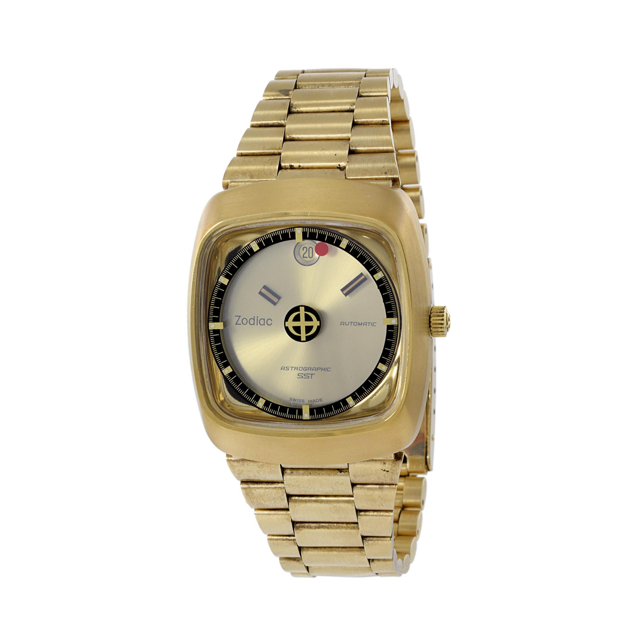 This is a NOS condition 1971 Zodiac Astrographic SST TV Case watch. This watch comes as a complete set including inner and outer boxes, booklets, and original hangtags!

The case of the watch is gold plate and 35mm wide and 41mm lug to lug. It is in