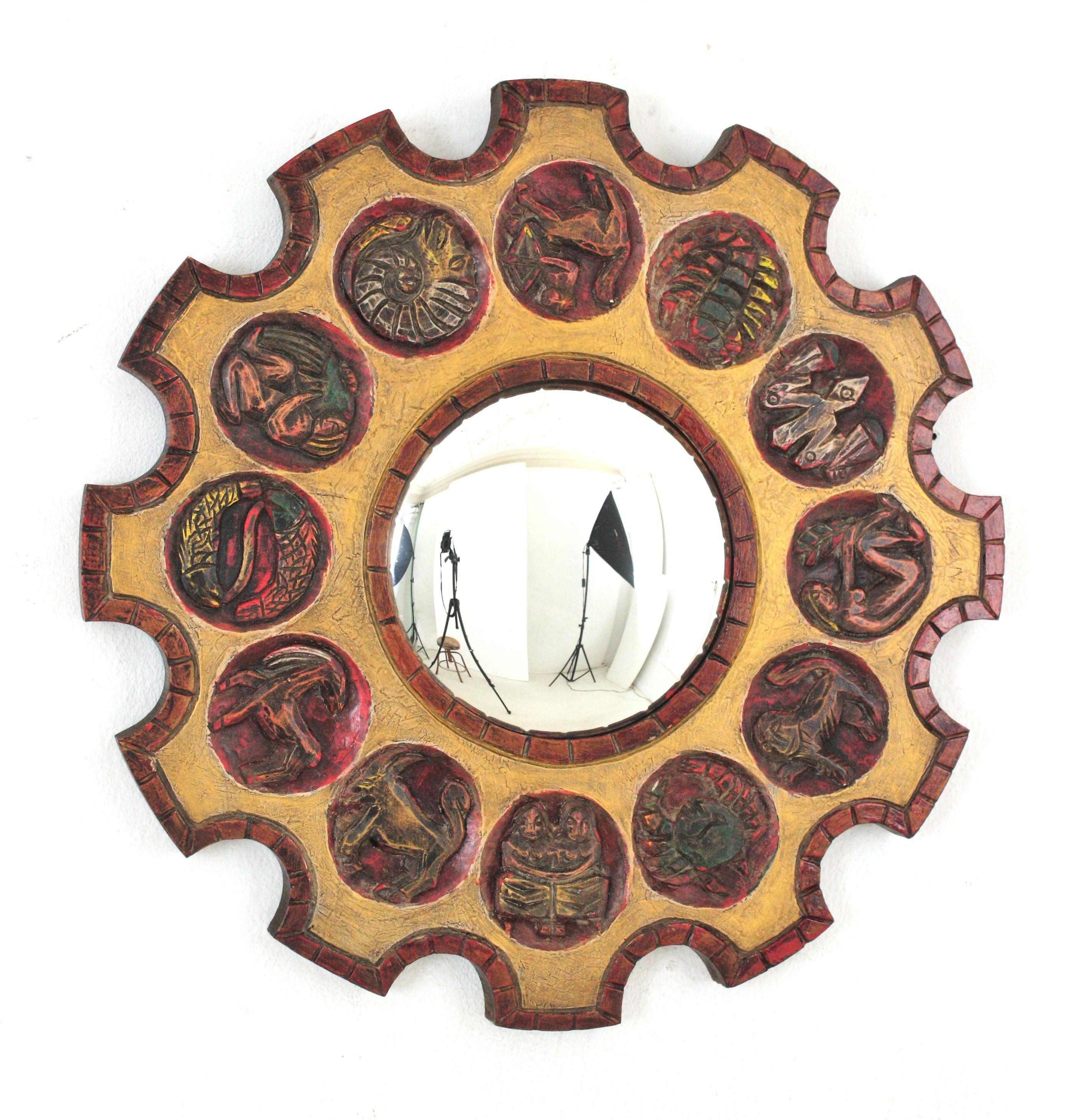 Zodiac sunburst convex mirror in Carved Wood, Spain, 1950s-1960s
Handcrafted Horoscope mirror with red and giltwood wheel frame and 12 signs of zodiac.
Stylized hand-carved zodiac signs on a starburst gilt wooden frame with red accents surrounding a