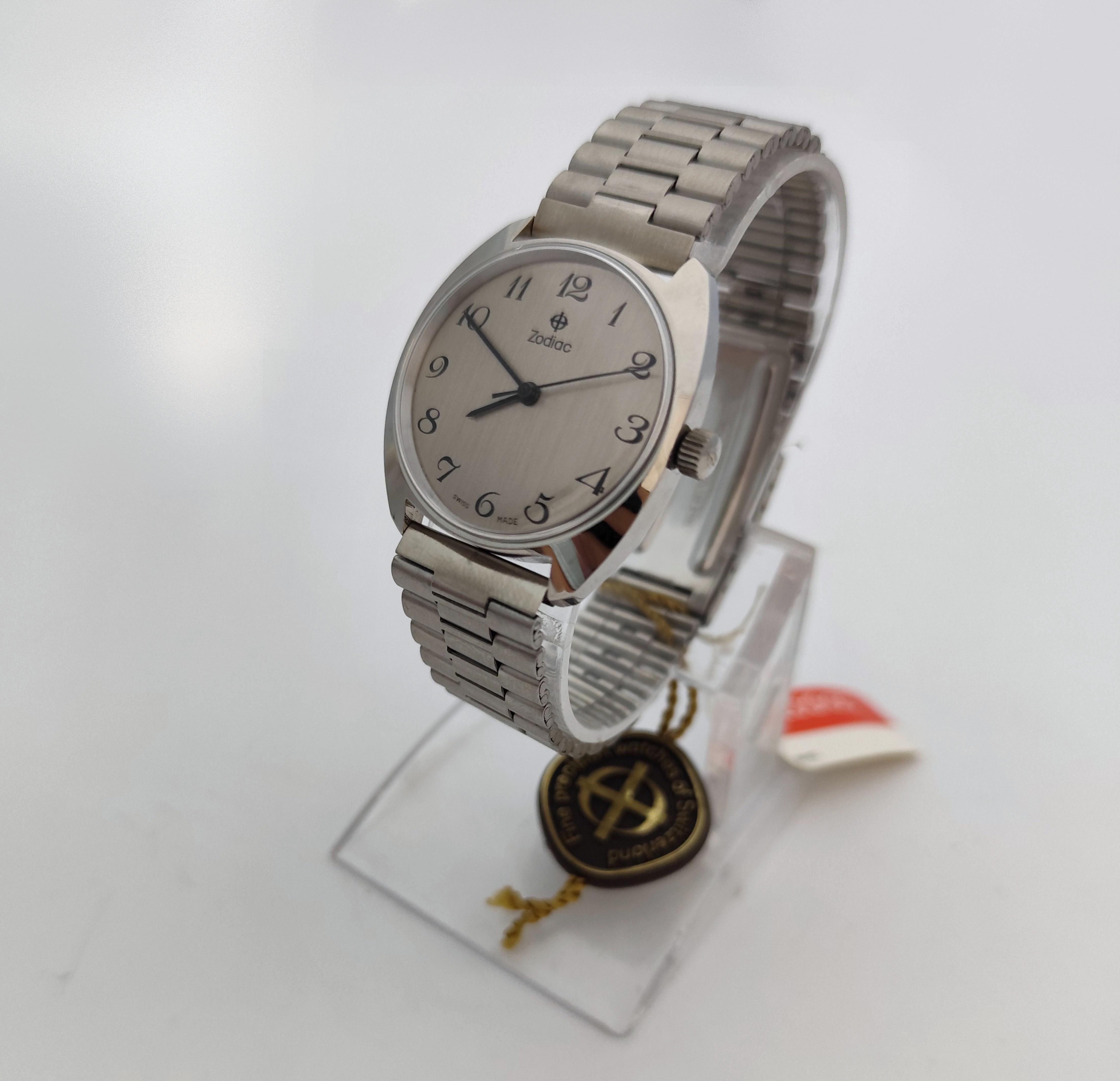 Brand: Zodiac

Model:  612 105

Country Of Manufacture: Switzerland

Movement: Automatic

Case Material: Stainless-steel

Measurements : Case width: 36mm. (without crown)

Band Type : Stainless-steel

Band Condition : In Excellent Condition, With