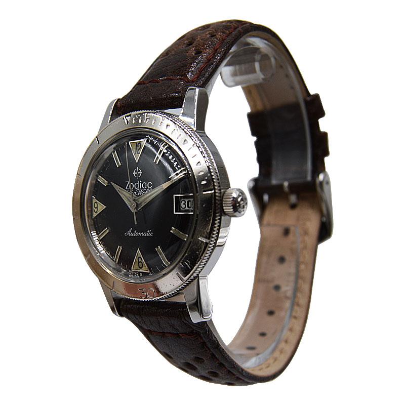 FACTORY / HOUSE: Zodiac
STYLE / REFERENCE: Diver
METAL / MATERIAL: Stainless Steel
CIRCA / YEAR: 1960's 
DIMENSIONS / SIZE: 43mm X35mm
MOVEMENT / CALIBER: Manual Winding / 17 Jewels 
DIAL / HANDS: Black/ Steel Pointed Hands
ATTACHMENT / LENGTH: 