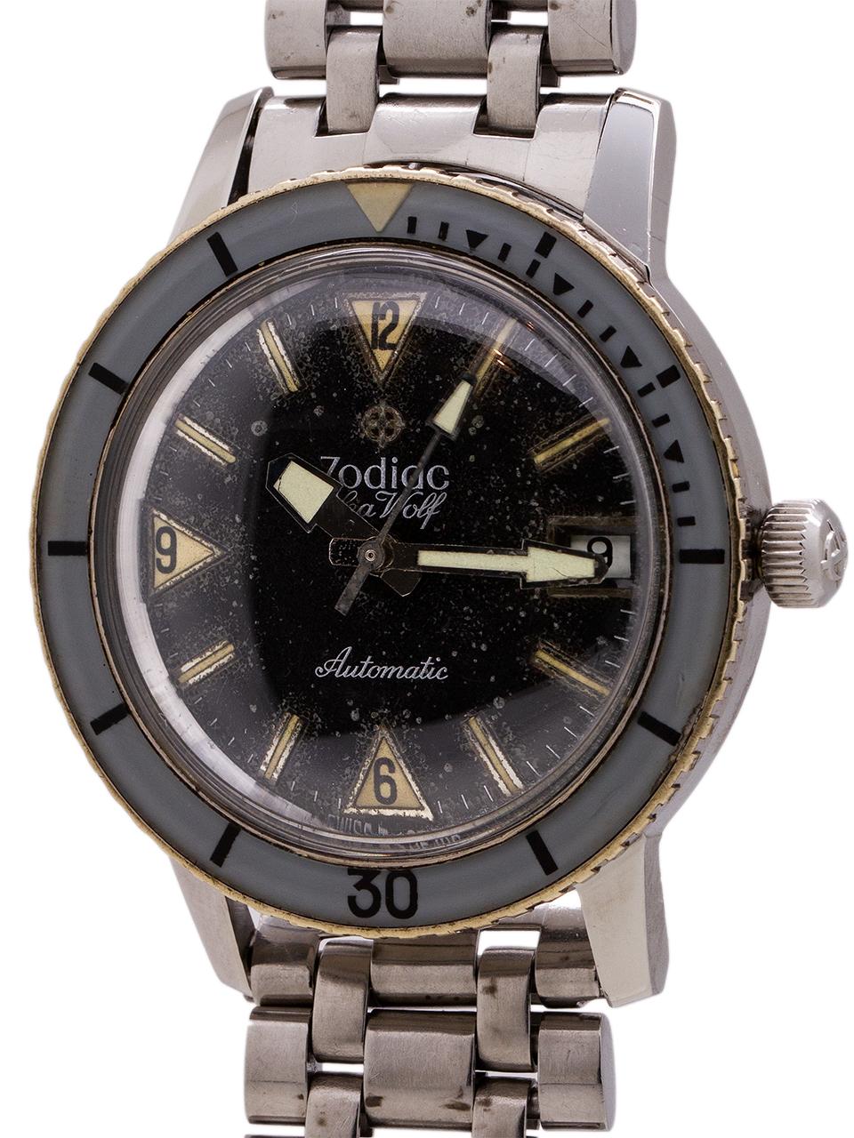 
Vintage 1960’s Zodiac Seawolf, popular diver’s model often associated with the Vietnam War and the U.S. Navy Seals. This is a very nice condition example, featuring a 35mm diameter case, gray bakelite elapsed time bezel, and spotted patina original