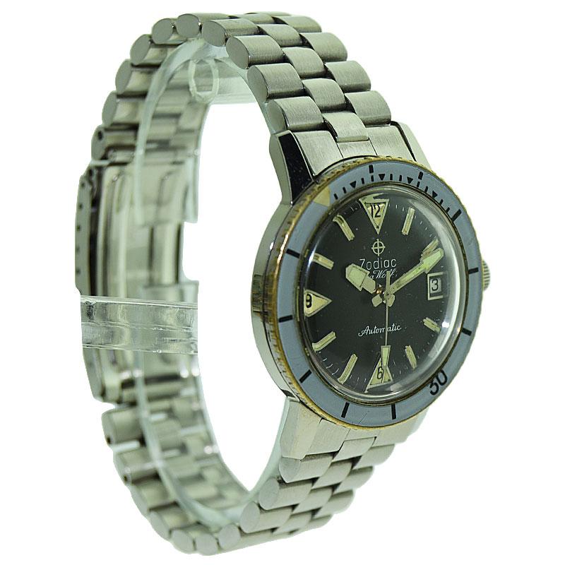FACTORY / HOUSE: Zodiac Watch Company
STYLE / REFERENCE: Sea Wolf
METAL / MATERIAL: Stainless Steel 
CIRCA: 1960's
DIMENSIONS: 43mm X 36mm
MOVEMENT / CALIBER: Manual Winding / 17 Jewels
DIAL / HANDS: Original Black
ATTACHMENT / LENGTH: Original