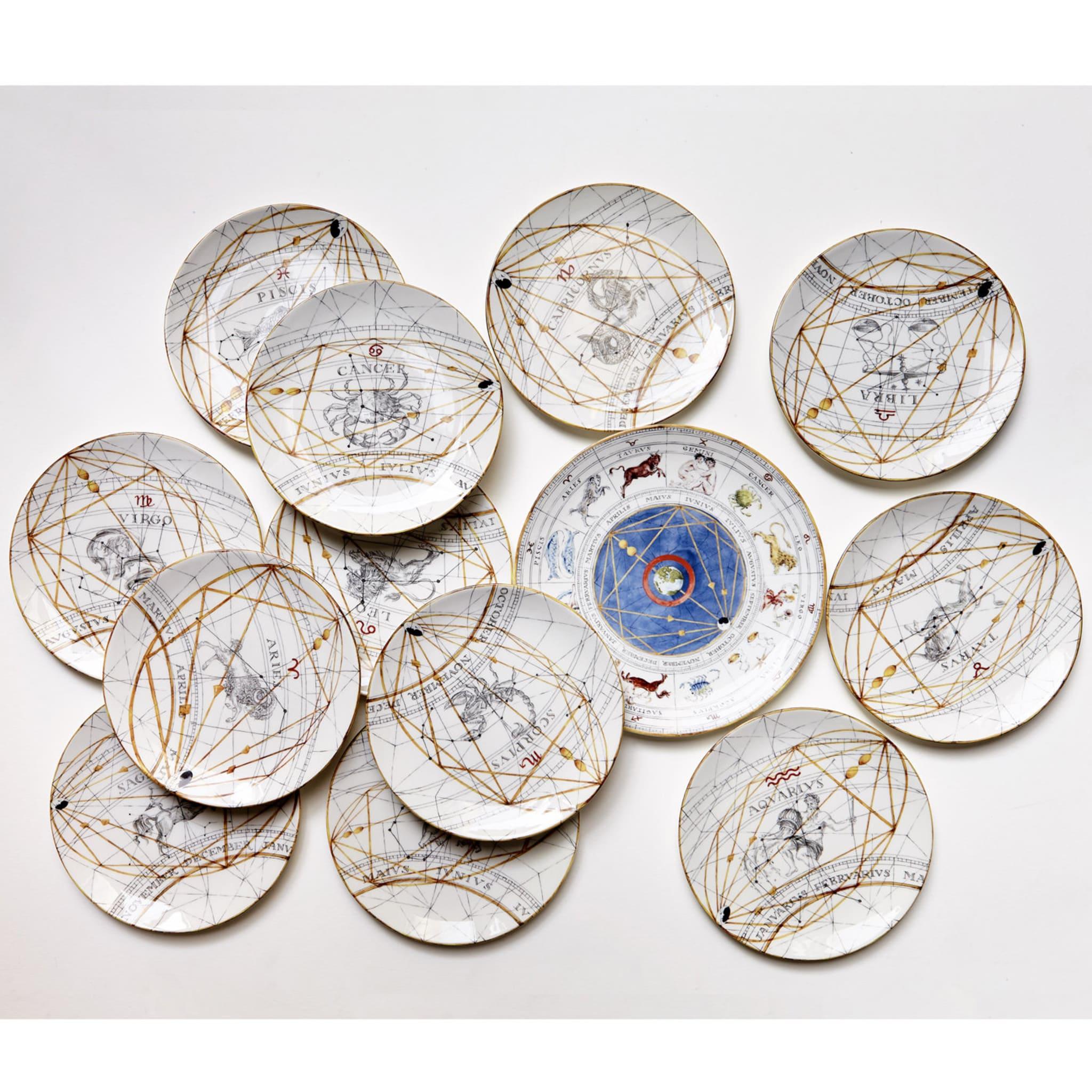 This superb ceramic plate is part of the Zodiaco collection introduced at the Milan Furniture Fair 2017. The center of this dish is adorned with a blue circle enclosing the earth and connecting with golden lines the twelve astrological signs that