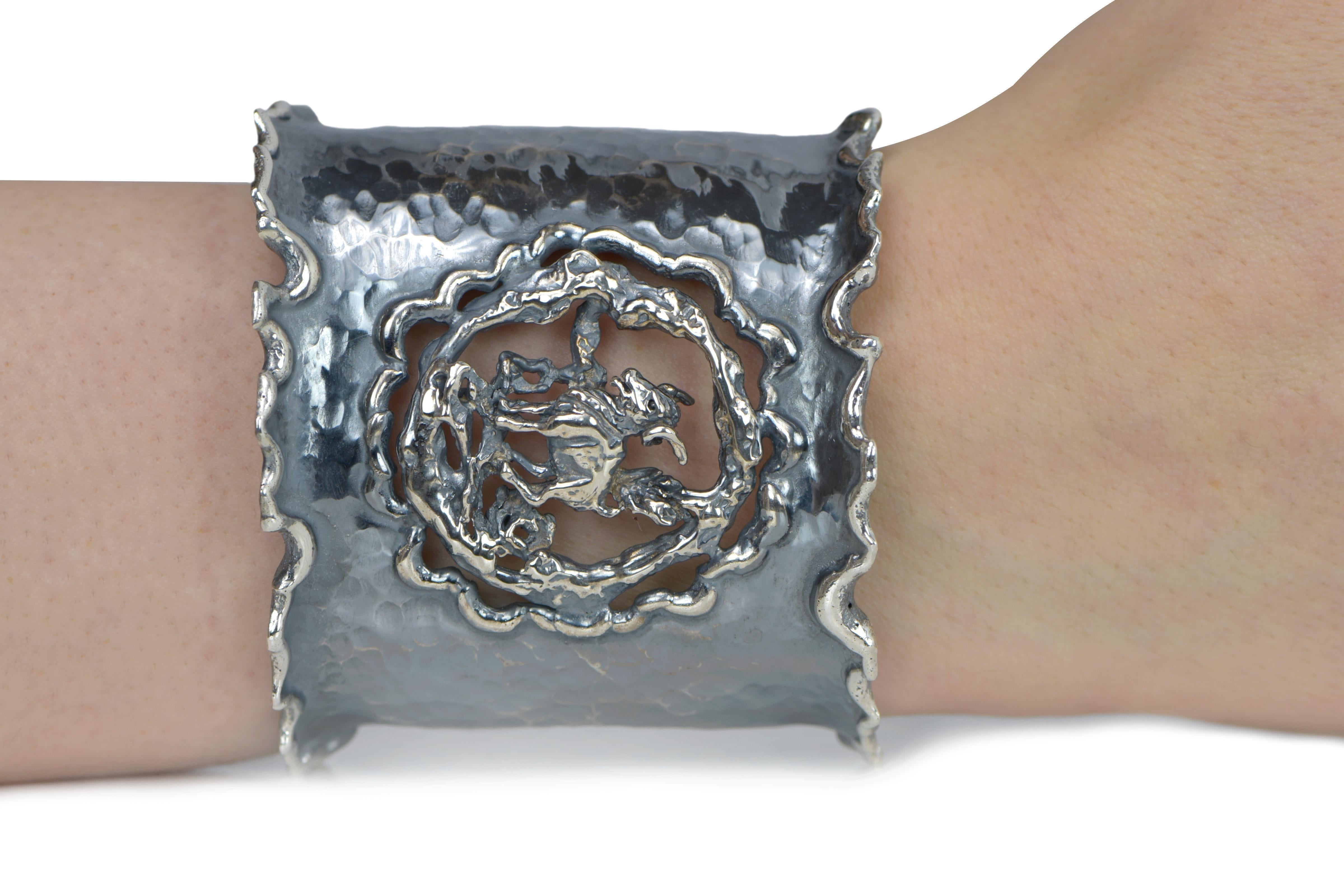 Hand Forged Silver Aries Adjustable Cuff Bracelet. About 2.5 inches wide. The metal does not contain any additional alloys that could compromise the strength or quality of the piece. Each Organic Silver Cuff Bracelet takes about 8 hours to complete,