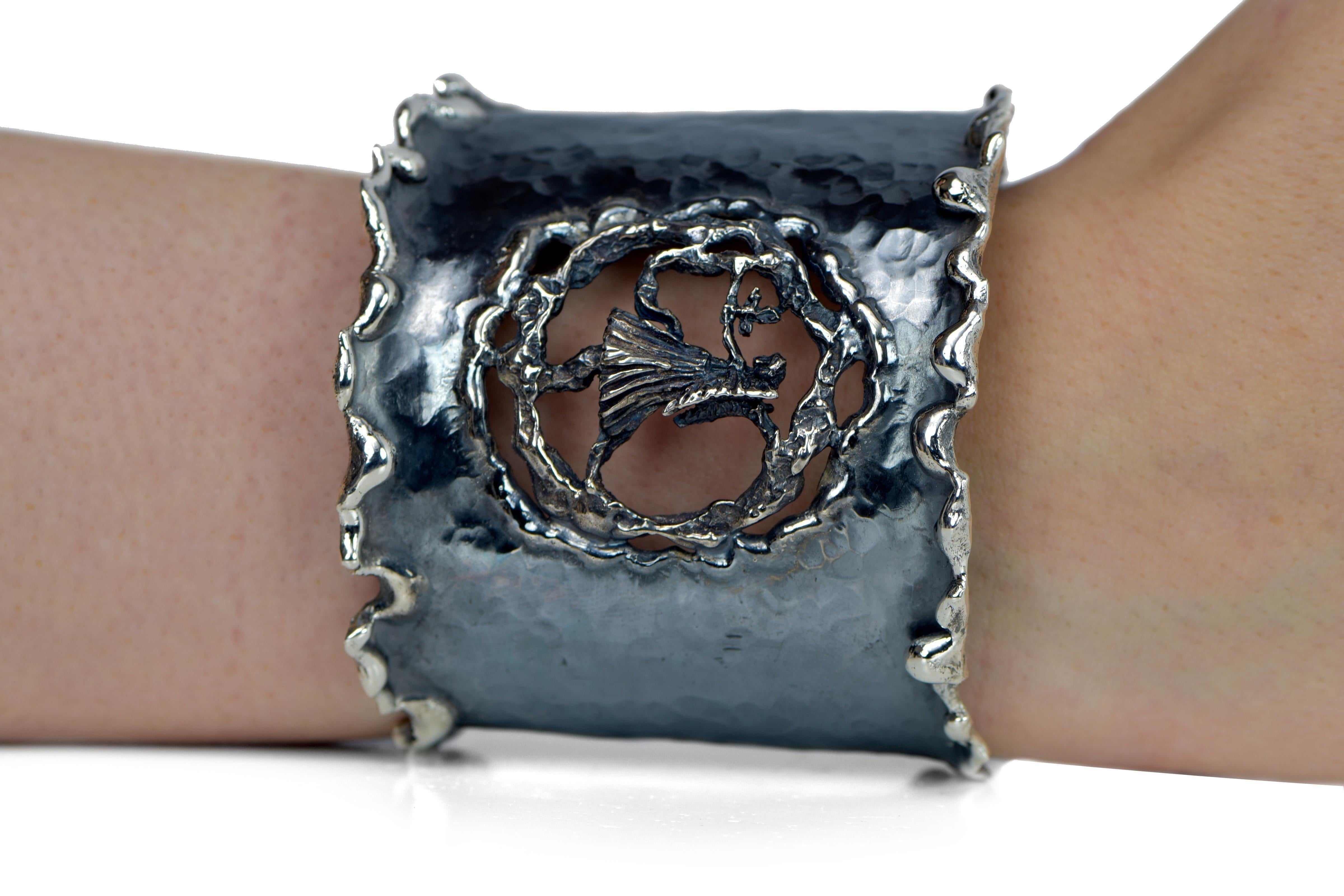 Hand Forged Silver Virgo Adjustable Cuff Bracelet. About 2.5 inches wide. The metal does not contain any additional alloys that could compromise the strength or quality of the piece. Each Organic Silver Cuff Bracelet takes about 8 hours to complete,