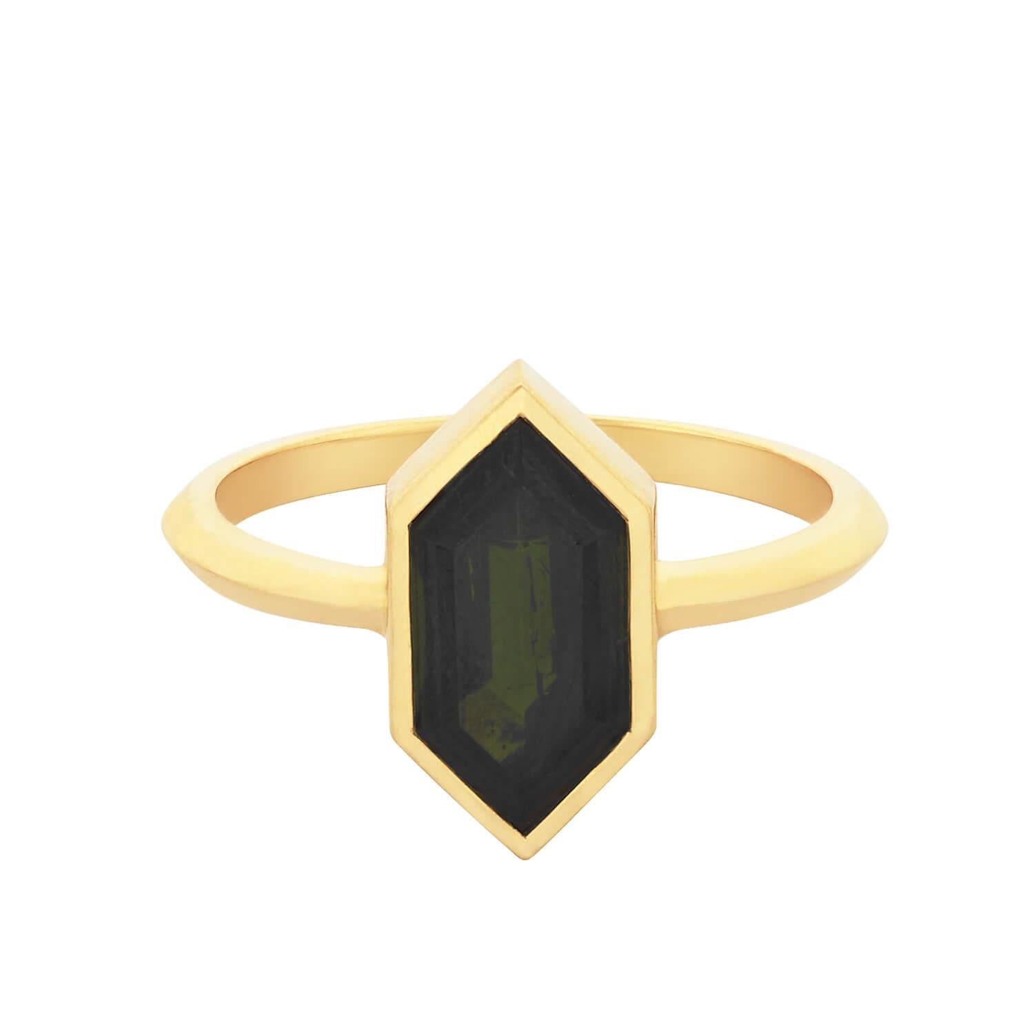 Ring size: 55

The Misti ring features a Green Tourmaline crystal cut set in an 18k gold frame. The pointed edge of the stone perfectly transitions into the sword edge band.

These bespoke hand cut stones make each ring truly unique, with their own