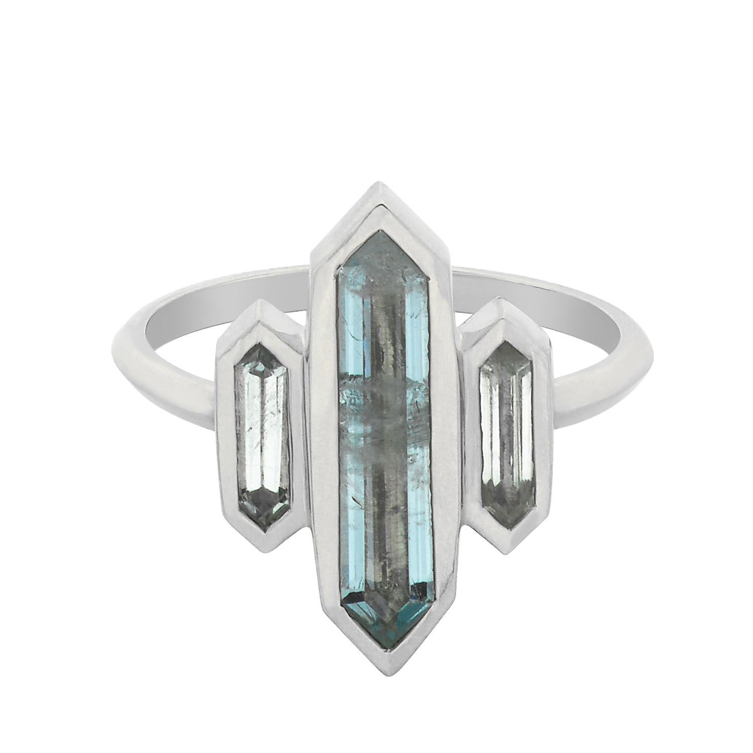 Kailas is the centre of the Buddhist universe, and the mountain, as well as two lakes over which it rises, have been sacred to Buddhists, Hindus, Jains, and Bonpos for thousands of years.

The Kailas ring features three crystal cut Aquamarine set in