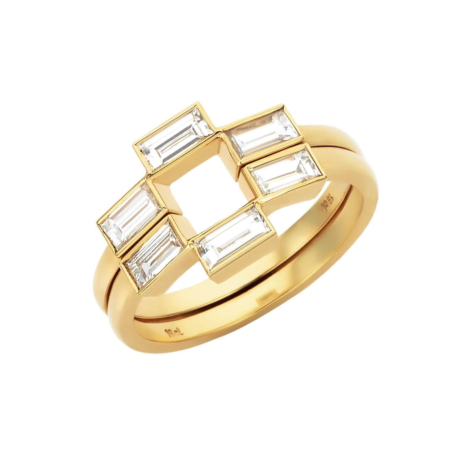 The Kester Wedding Bands honour the timeless and classical beauty of the baguette cut.

The stepped design of the diamonds align perfectly around the Callida Engagement ring to enhance the solitaire diamond.

2 x 18k Yellow Gold wedding bands, with