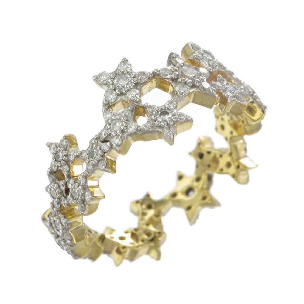 Ring size: 53

Our Milky Way Ring wraps itself around your finger and holds diamonds in its starry embrace. 
Let the magic of starlight embrace you! 

9k yellow gold ring with white rhodium plate set with white round diamonds.

Milky Way of Diamonds