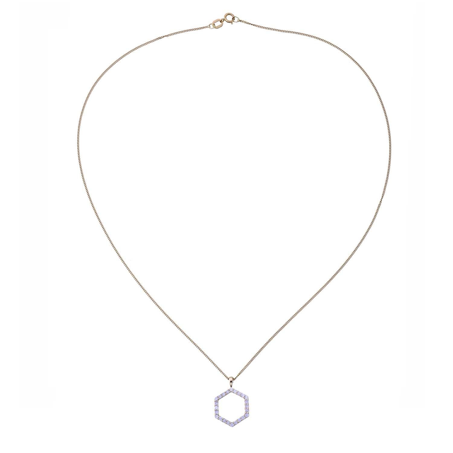 From DNA to minerals and crystals, emerald and aquamarine to beehives, the hexagon is one of the primary organisational structures of nature.
It maintains its perfect symmetry, which is simple, striking and balanced.

9k yellow gold necklace, set