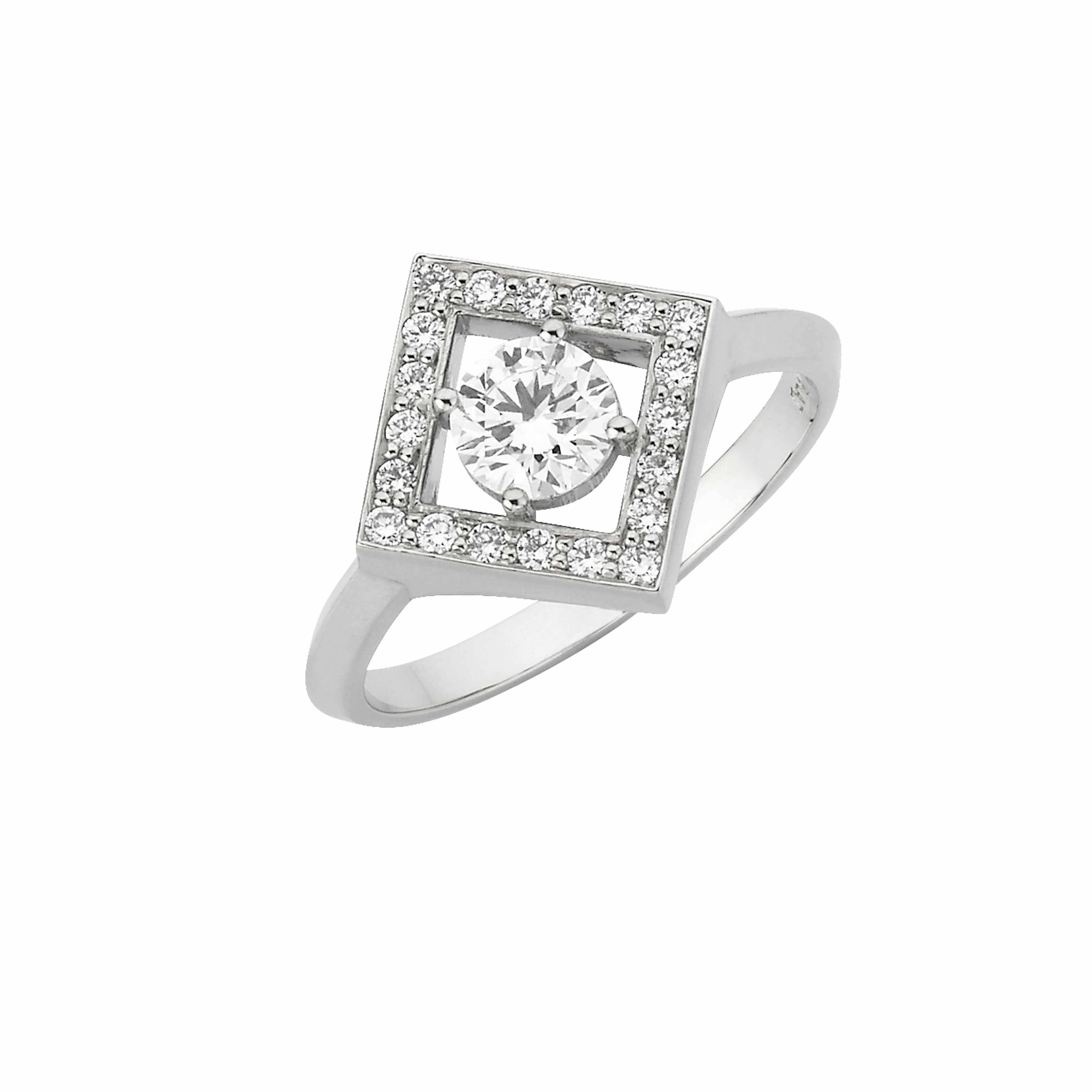 The Amavi Engagement Ring is set with a central diamond that is delicately framed by a square with 20 grain set round brilliant cut diamonds. This elegant form represents the ways in which we navigate through life, the points of the compass, the