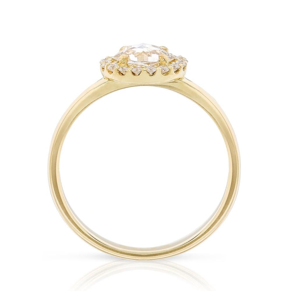 Ring size: 53

The halo of brilliant round diamonds of the Aura Engagement Ring enhances the radiance of the rose cut center stone. Together they create a beautiful illumination throughout the design.

18k Yellow Gold Engagement Ring, with a Rose