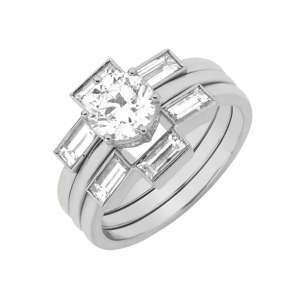 Set size: 52

Callida means ‘the most beautiful’, and embodies elegance and eternal affection. At its heart is a brilliant cut, 1 carat solitaire diamond. Beneath the setting is a band of pavé set diamonds for a secret layer of sparkle.

The Kester