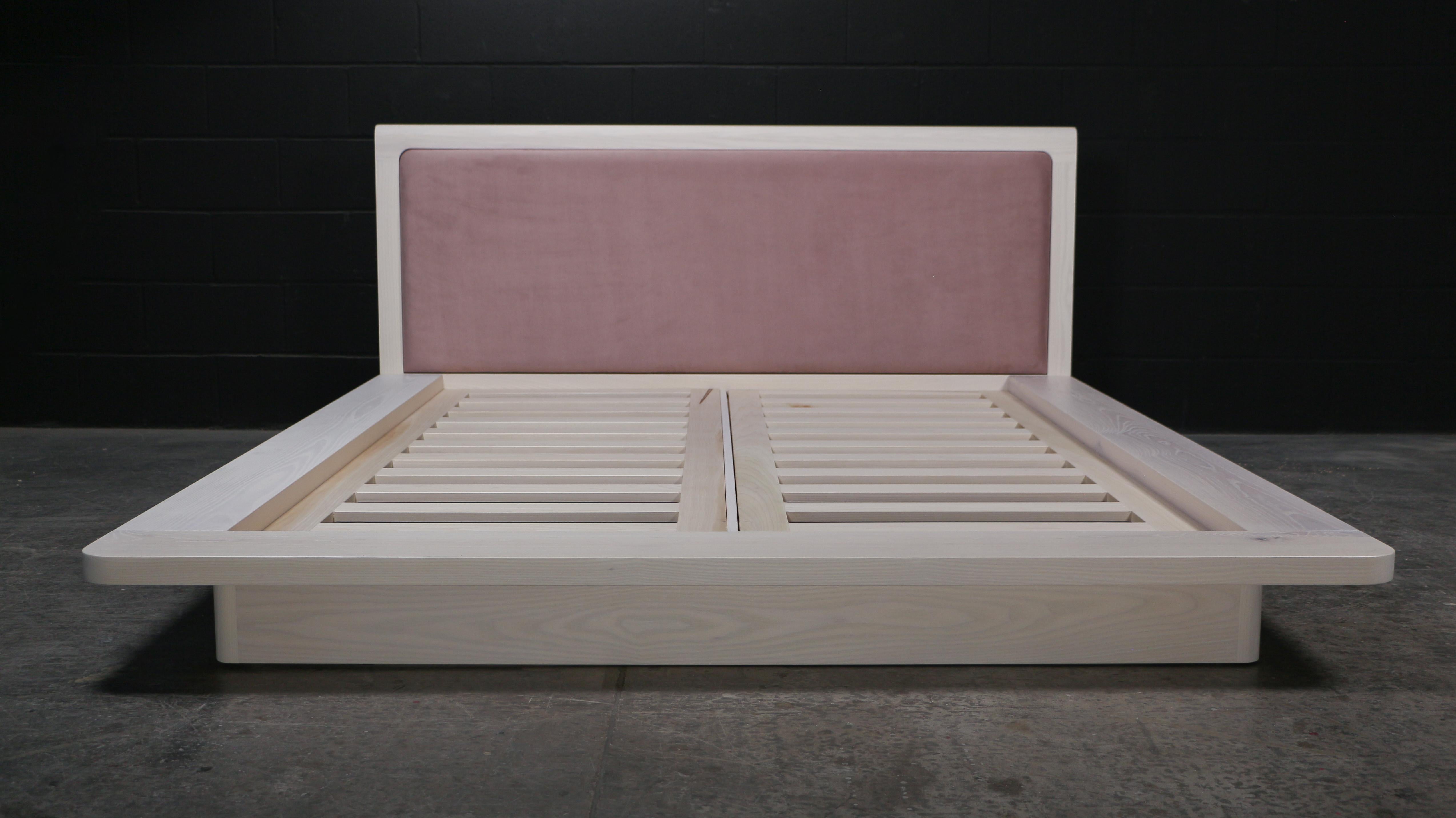 The ZOË Bed features a low, wide platform and is meticulously crafted from solid wood. Its unparalleled design gives the illusion of floating while providing a sturdy foundation for your mattress. The sumptuous suede headboard, rounded edges, and