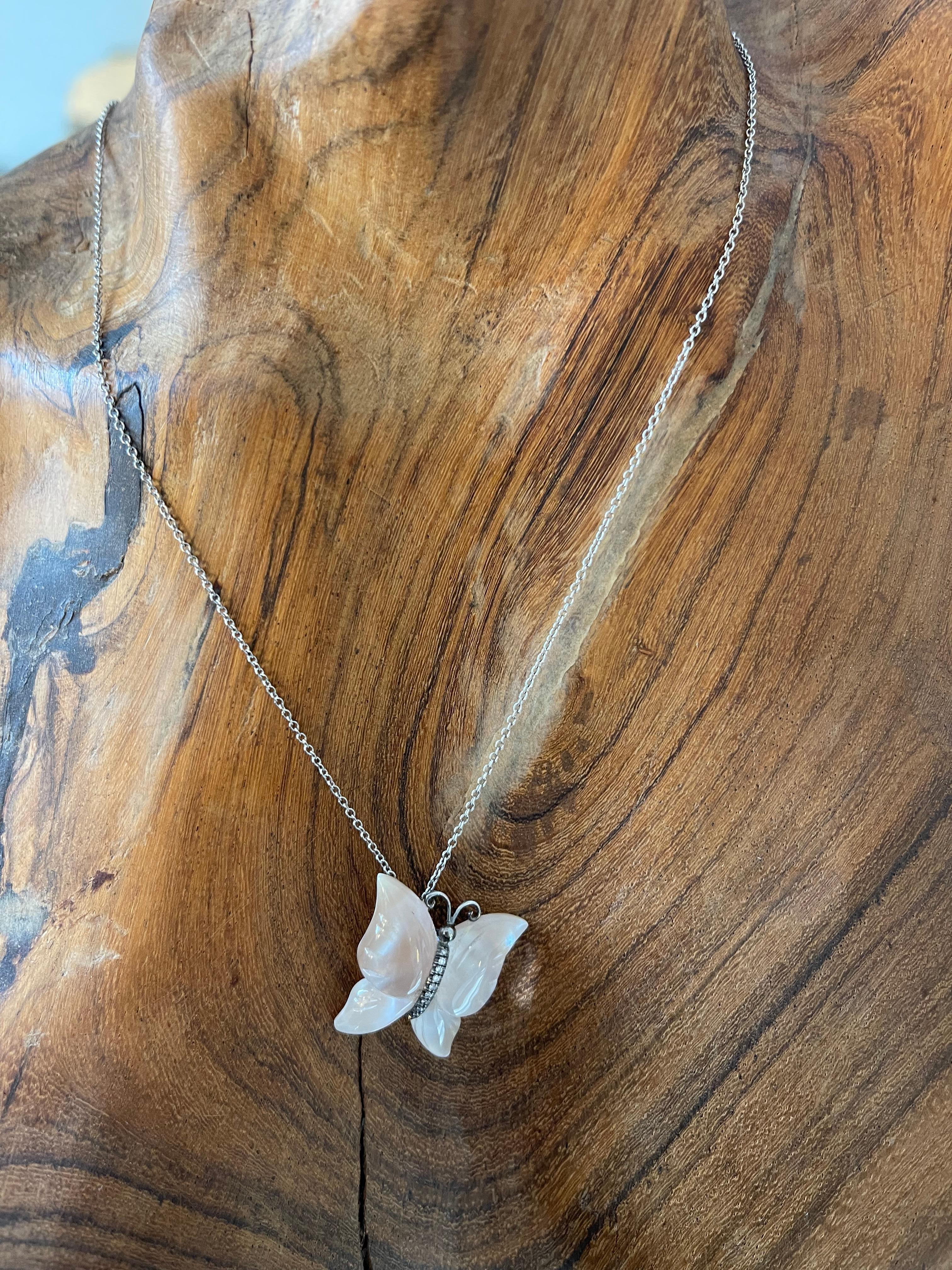 Zoe X blueviewATELIER diamond rose quartz mother of pearl backed butterfly platinum necklace 18 inches with adjustable loop at 16 inches 

Zoe was sold exclusively at the fine jewelry department in Barneys New York across the country from 2005 until