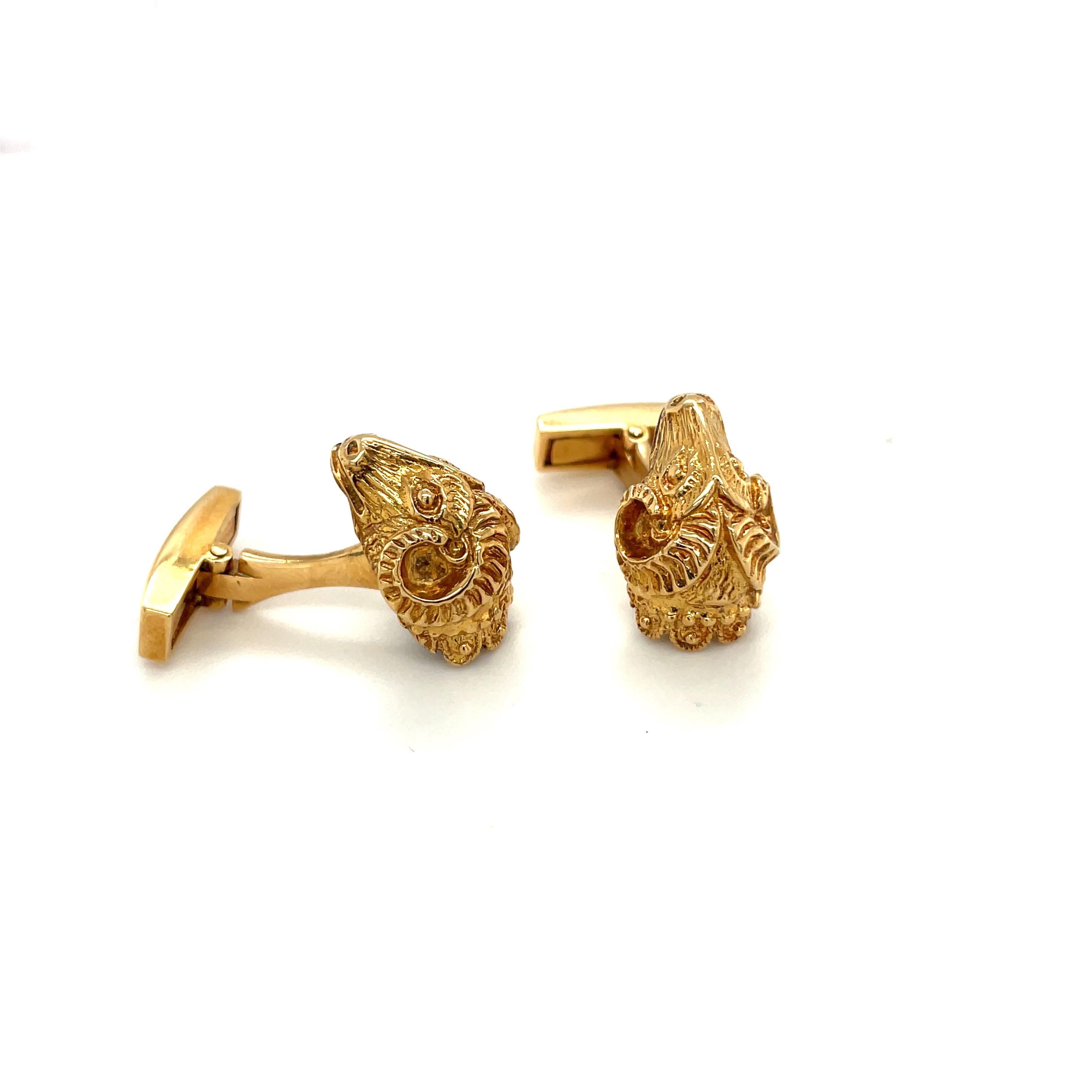 18 karat yellow gold ram's head cuff links. These cuff links are designed by Zolotas of Athens , Greece. Founded in 1895 the company merges Greek heritage with modern style to create these timeless pieces. 
Stamped  Zolotas 18K 750 