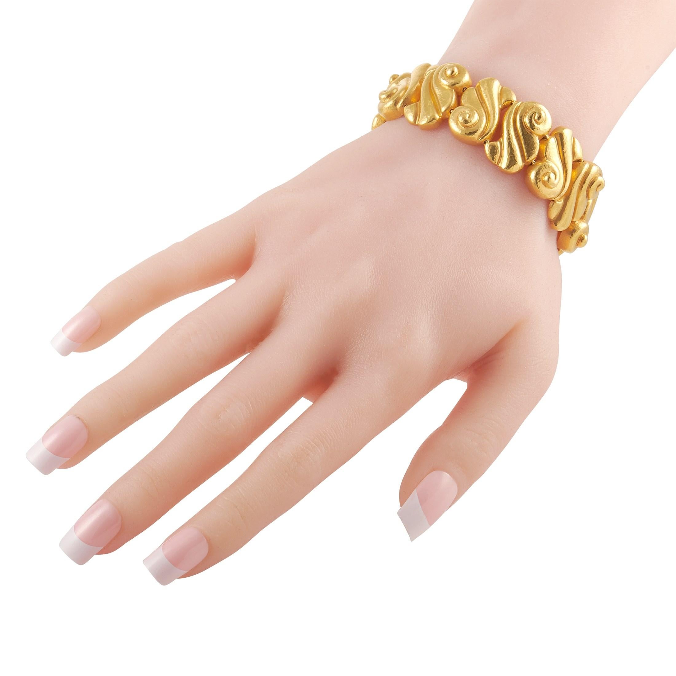 This captivating bracelet from Zolotas recalls the beauty and refinement of a bygone era. Crafted from 22K Yellow Gold links with a sculptural sense of style, this 7” long bracelet is a statement-making piece that commands attention in the best way