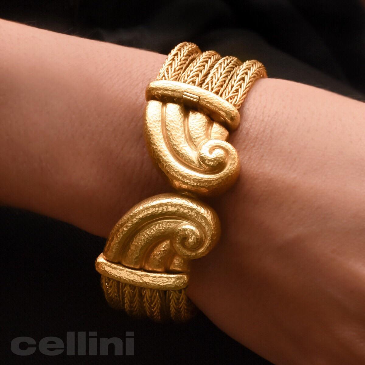 Four 18kt/ 22kt yellow gold woven ropes with a classical Greek motif center. This bracelet is designed by Zolotas of Athens , Greece. Founded in 1895 the company merges Greek heritage with modern style to create these timeless pieces. Coveted by