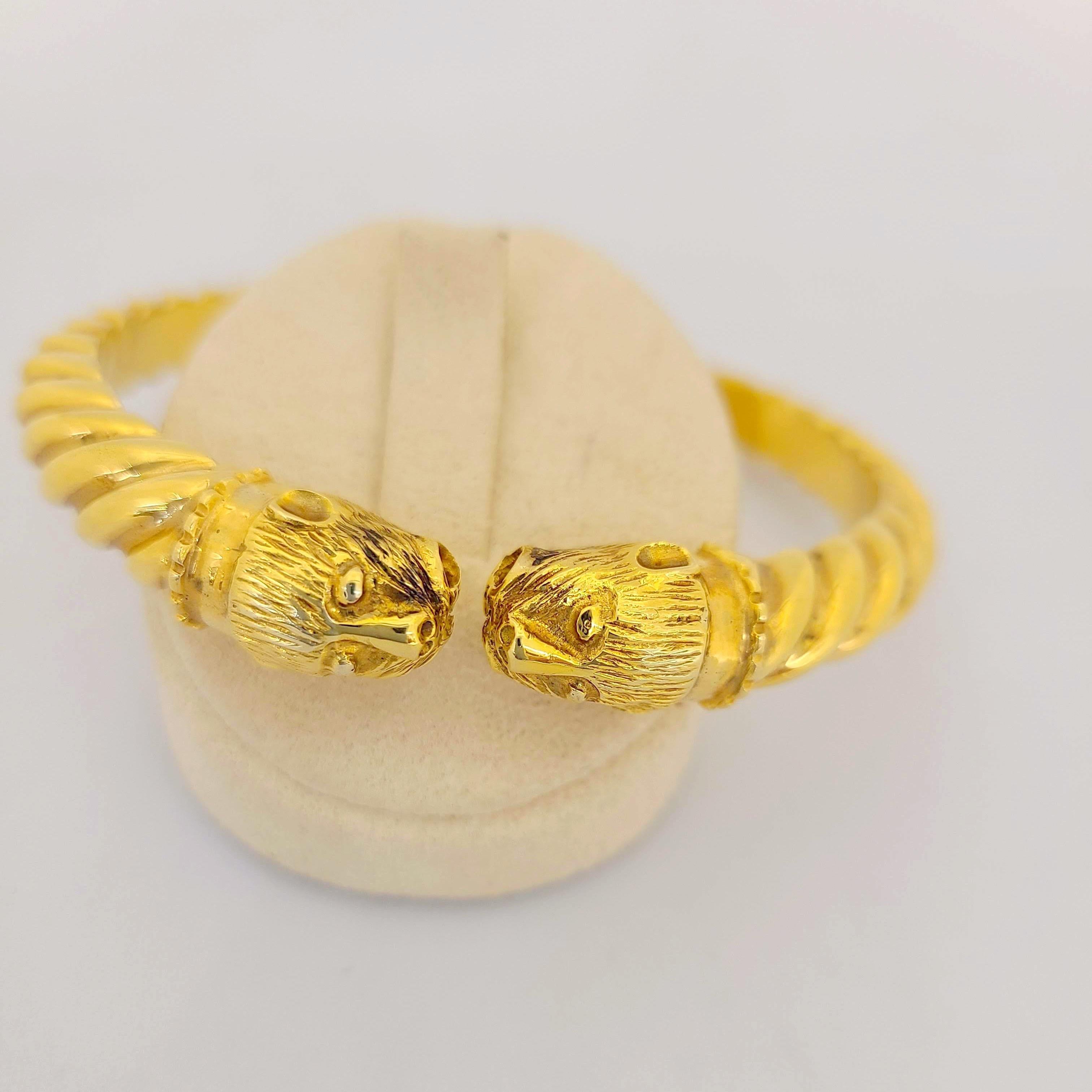 This 24/18 karat yellow gold bracelet was designed by Zolotas of Athens , Greece. Founded in 1895 the company merges Greek heritage with modern style to create these timeless pieces. Coveted by Royals and Actresses.
The bracelet is designed with two