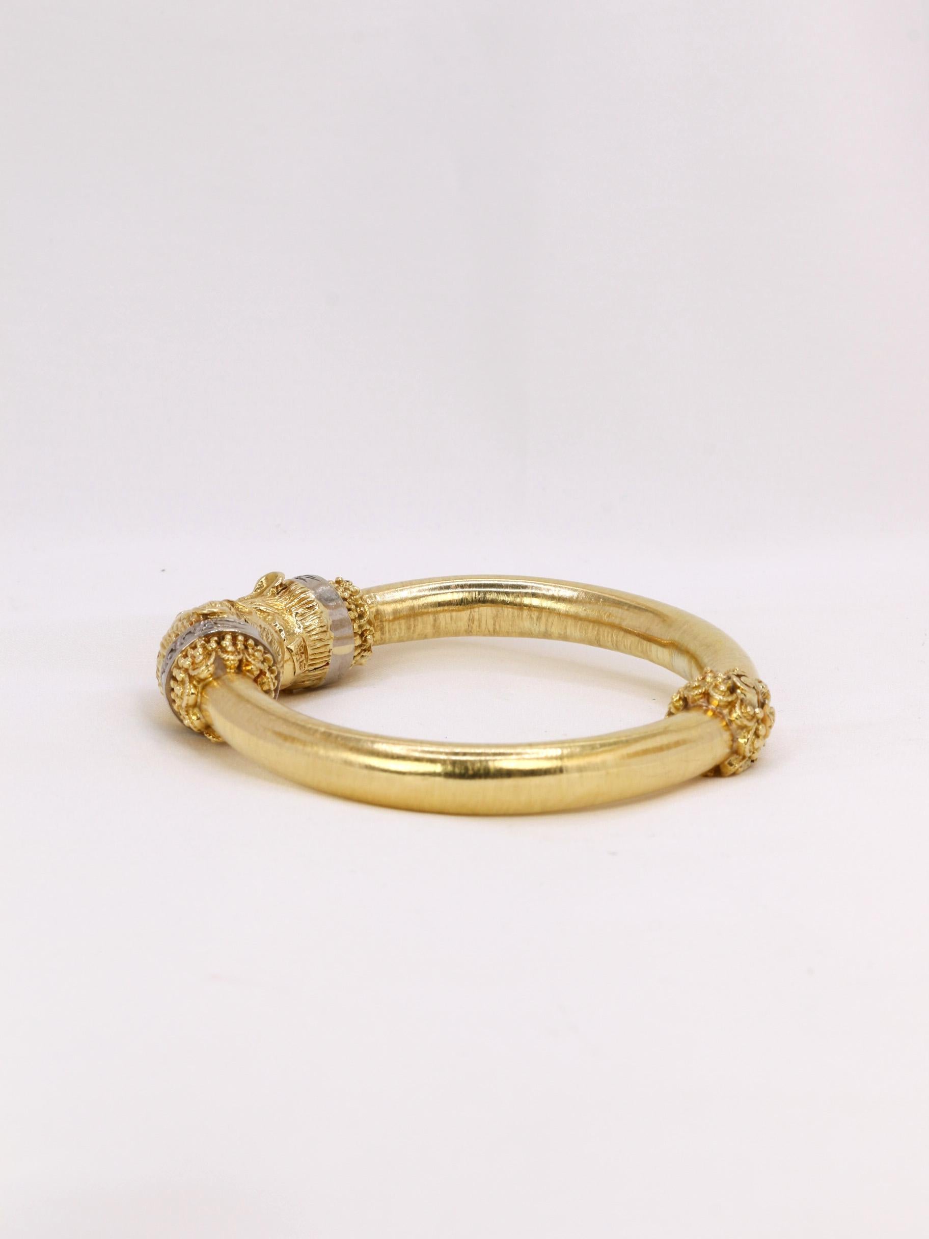 Greek Revival ZOLOTAS feline head bracelet in gold, rubies and diamonds