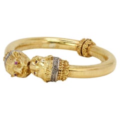 Vintage ZOLOTAS feline head bracelet in gold, rubies and diamonds