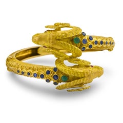 Zolotas gemstone 18k yellow gold Ram's head crossover bangle Zolotas gemstone 18k yellow gold Ram's head crossover bangle