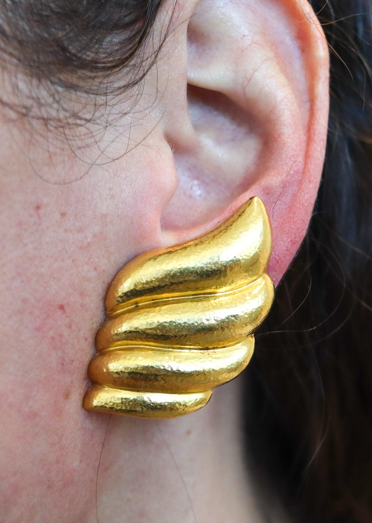Clips-on earrings designed by Zolotas.

Magnificent pair of clips-on earrings, created in Athens Greece by the jewelry makers of Zolotas, back in the late 1970's. These gorgeous pair of earrings are a real statement and was carefully crafted with
