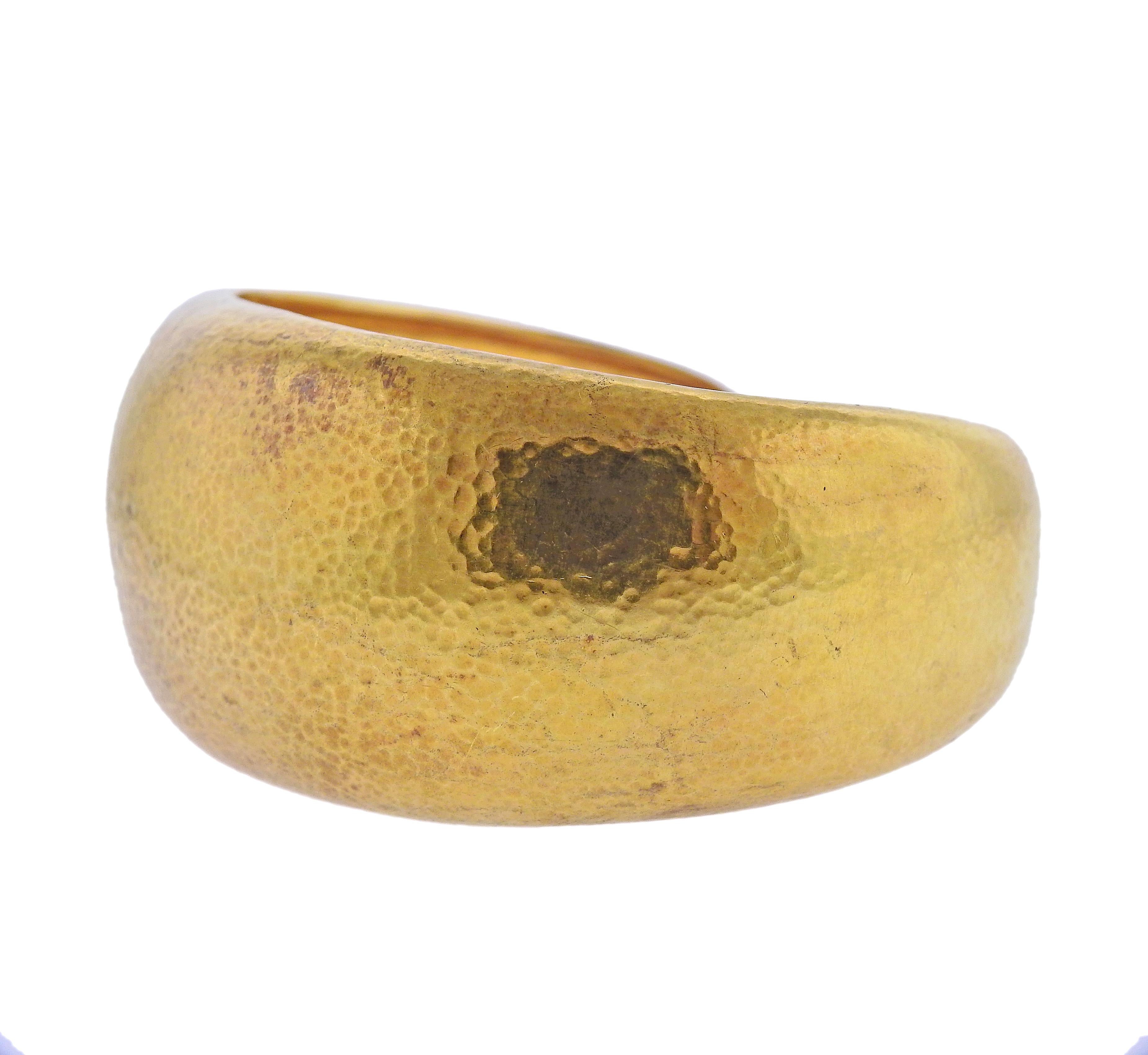 22k hammered finish gold cuff bracelet by Zolotas of Greece. Bracelet will fit approx. 7