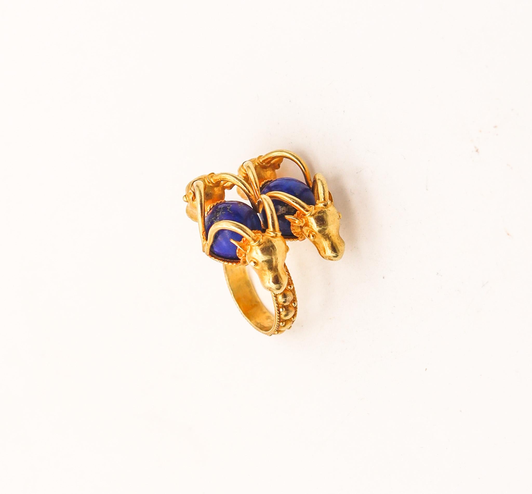 Rams cocktail ring designed by Zolotas.

A sculptural cocktail ring, created in Athens Greece by the jewelry makers of Zolotas, back in the late 1970's. This gorgeous ring is a real statement designed in three dimensions with ancient Greek patterns
