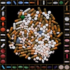 Big gold box of pills. Color Photograph