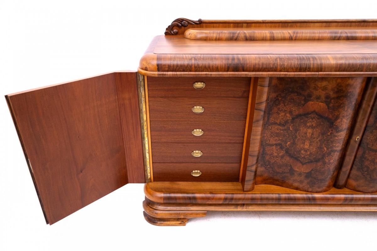 Walnut zoom_in Large Art Deco chest of drawers from the 1950s, Poland. After renovatio For Sale