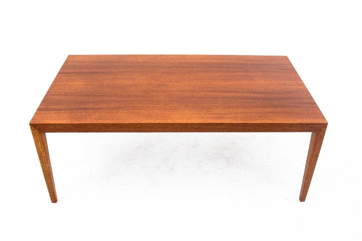 Art Deco style table from the mid-20th century.

The minimalist design will work perfectly in contemporary interiors. The table is manufactured by Haslev Mobelsnedkeri, the manufacturer's original sticker under the table top.

The furniture is in
