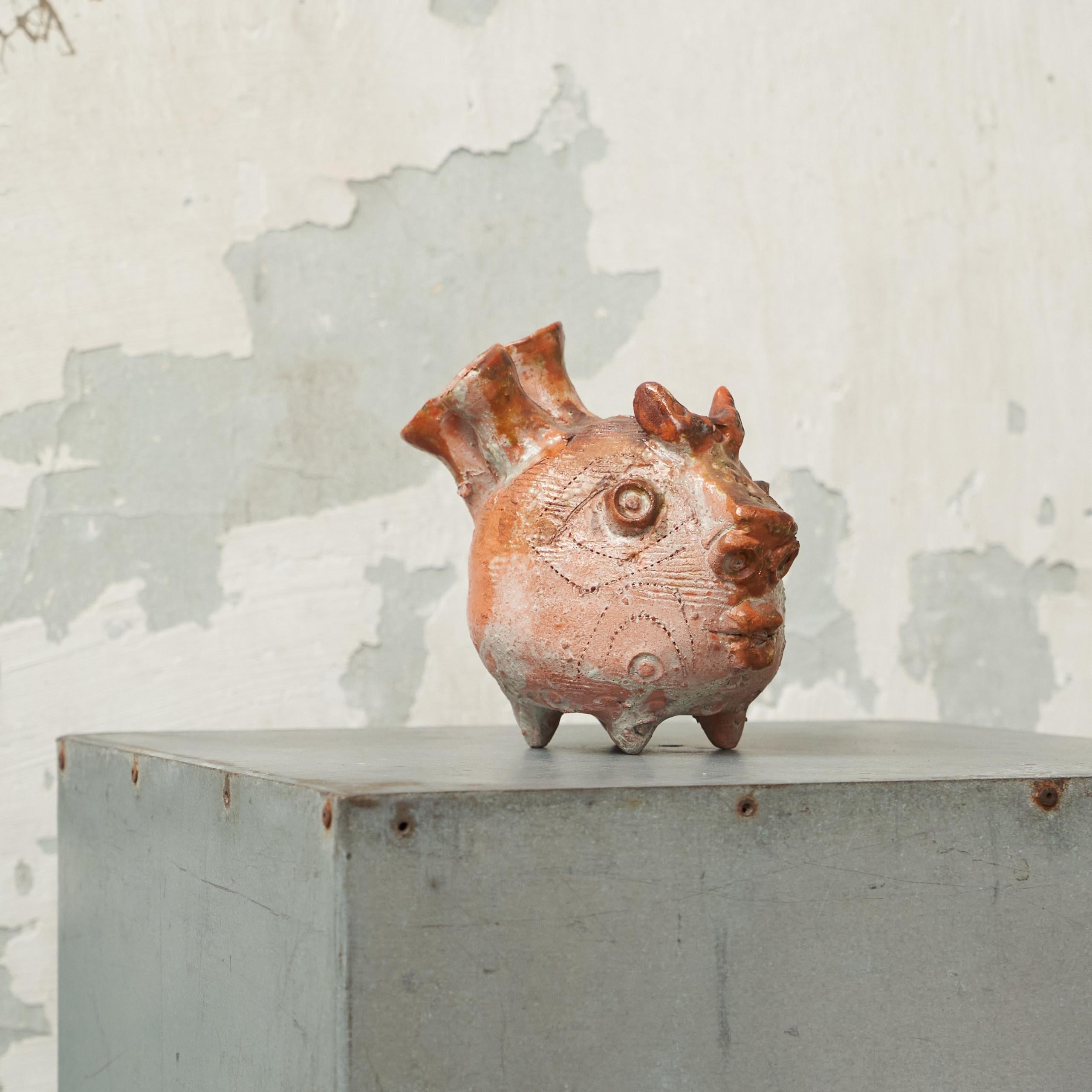 Zoomorphic Mid Century Studio Pottery Phantasy Animal, Europe, 1960s.

This is a fantastic mid century phantasy animal in studio pottery - reminds us of the works by Etie van Rees and also of some works by Roger Capron. 

Great zoomorphic design,