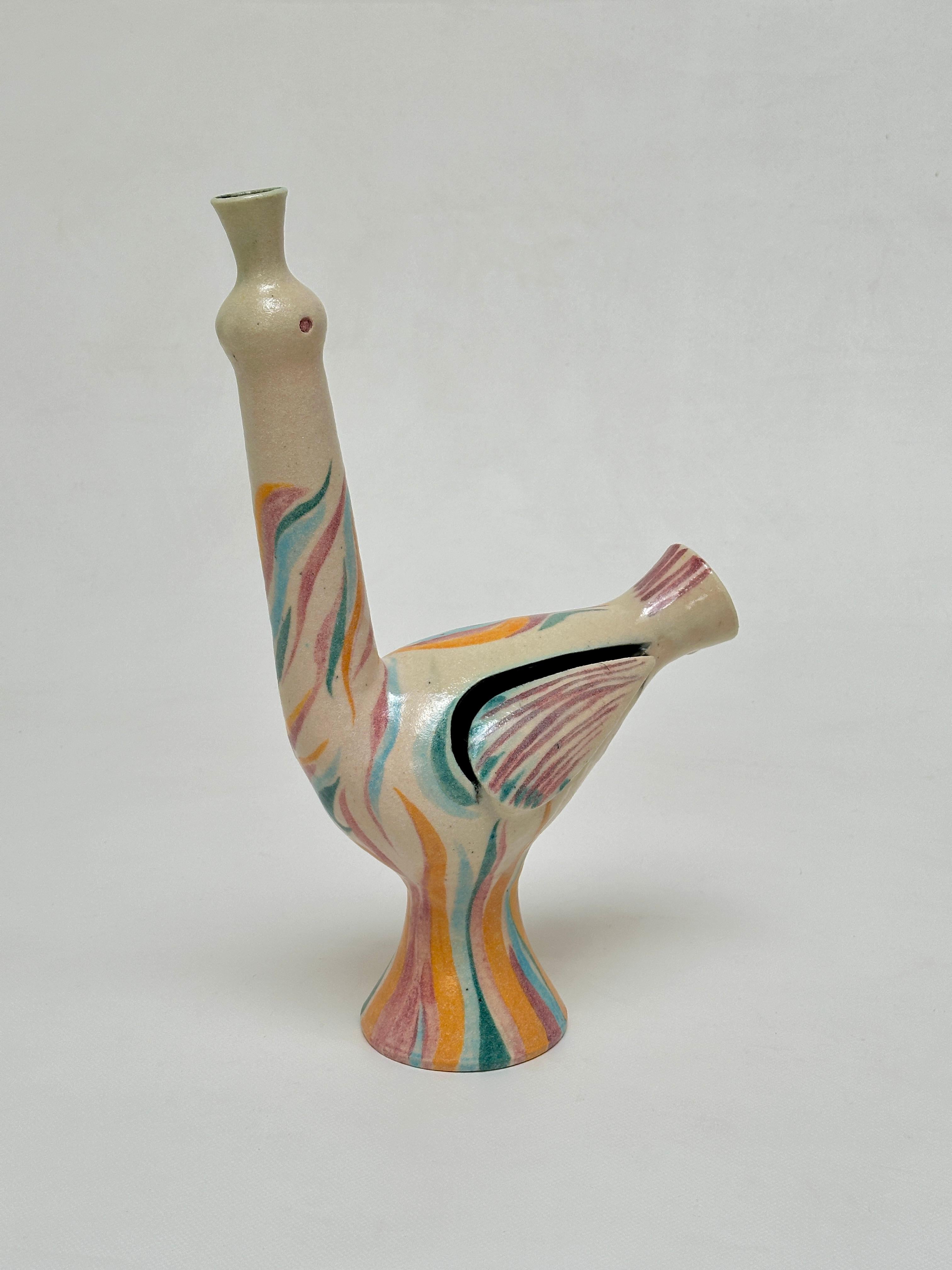 
Grande ceramica policroma a forma di uccello stilizzato.
I volumi ritagliati permettono a questo elegante pezzo di trasformarsi in un apparecchio di illuminazione.

Perfette condizioni originali.

Informazioni su Accolay 

Accolay designa sia il
