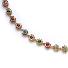 Bracciale Zorab 18Kt YG con diamanti, zaffiri multicolori e semi preziosi
