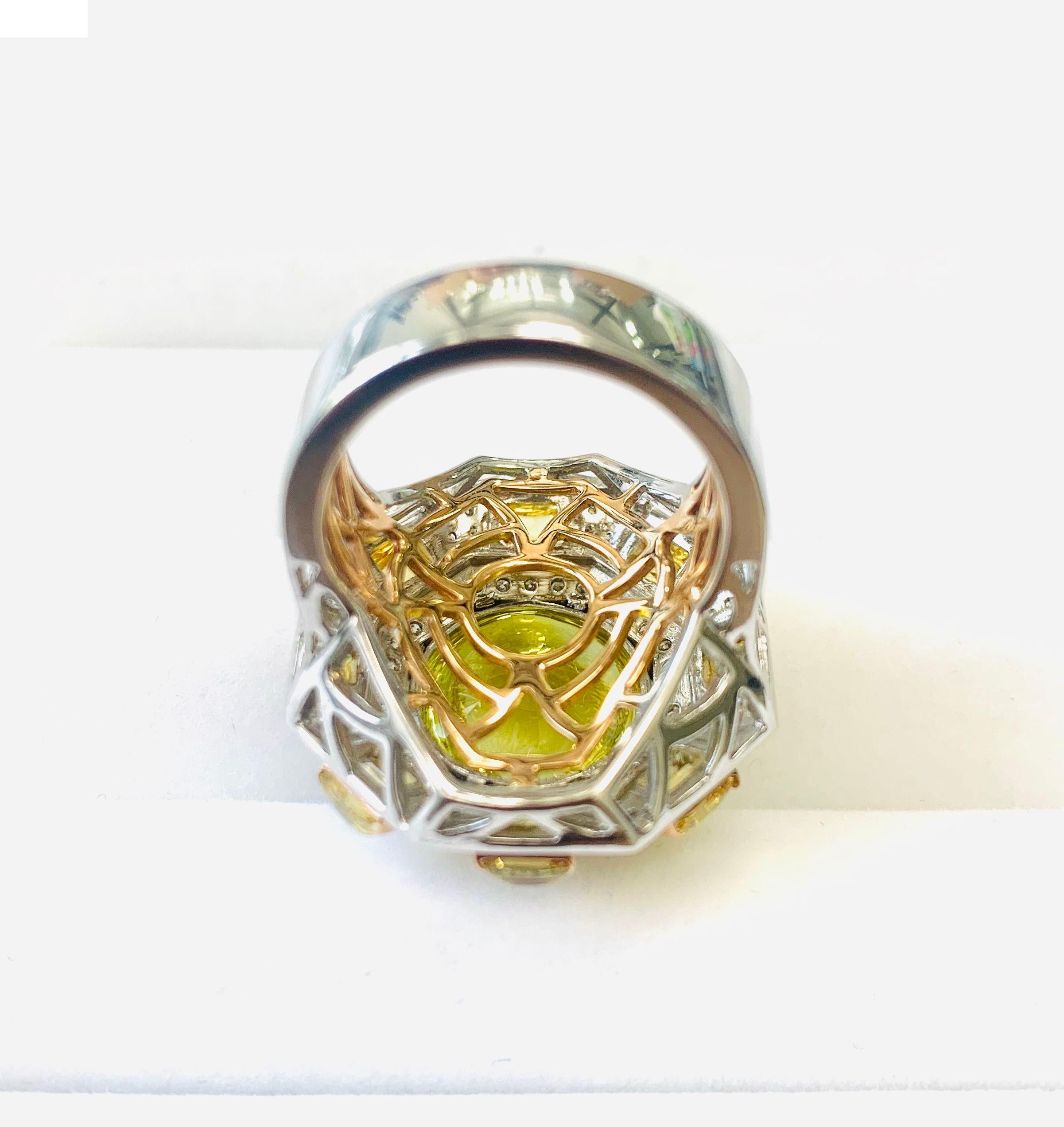 Just in time for summer, this 18k gold and palladium ring exudes a tropical vibe with its bright, lemony color. The joyous honey yellow hue is created with a faceted scapolite showcasing a blend of yellow hues, surrounded by eight smaller scapolites