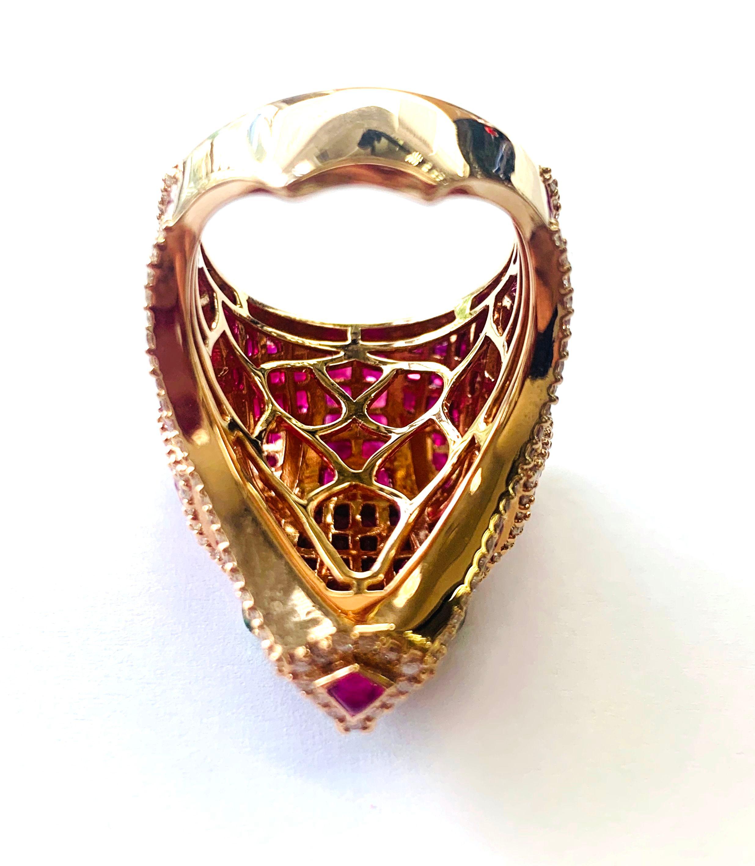 A bear made of matching square-shaped 44.29-carat rubies paved on 18k gold and palladium from its rounded nose to its pointy ears is further highlighted by rows of 1.23-carat diamonds. Its green glowing eyes are made of two 0.28-carat tsavorites.