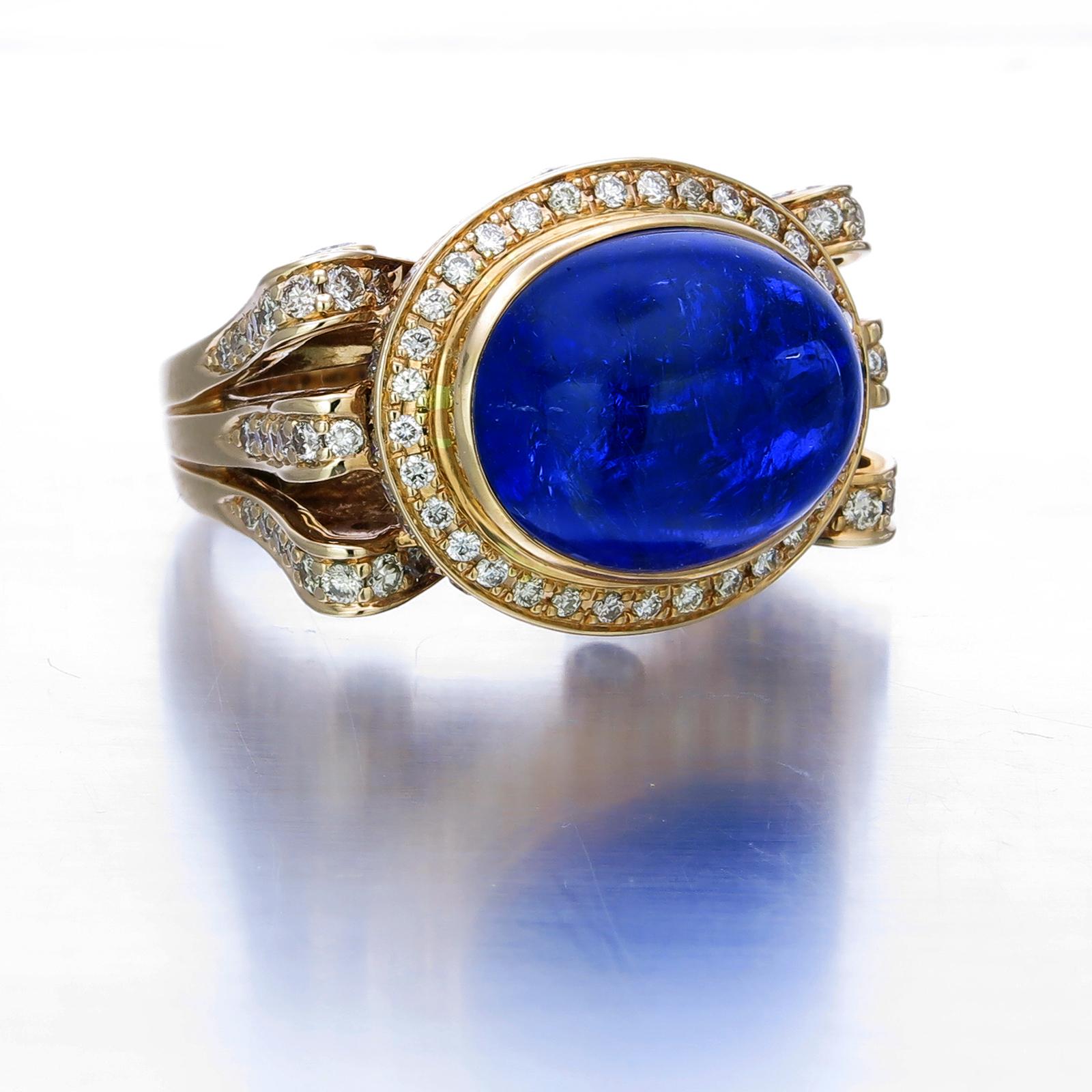 The depth of blue in this 14.30-carat oval Tanzanite is mesmerizing as it rests on a well-crafted 18K gold ring surrounded by sparkling 1.68-carat White Diamonds. An adjustable gold band in the ring provides a more secure fit and an extra level of