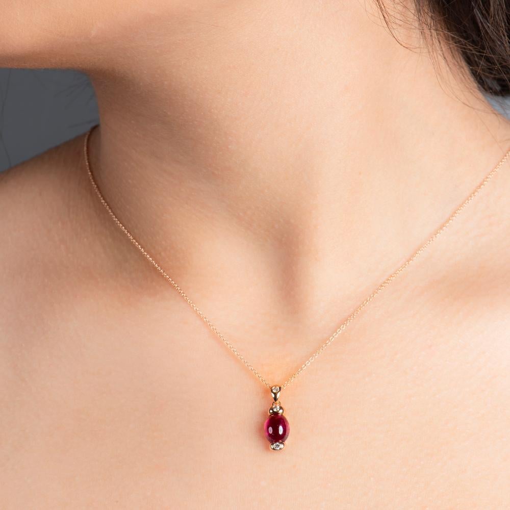 
Beautifully dainty and wildly ornate, this lavish pendant is perfect for adding feminine flourishes to any outfit or garment.

Featuring a flawlessly cut 2.10 carat rubellite tourmaline as the integral part of the pendant, the gem is set into a