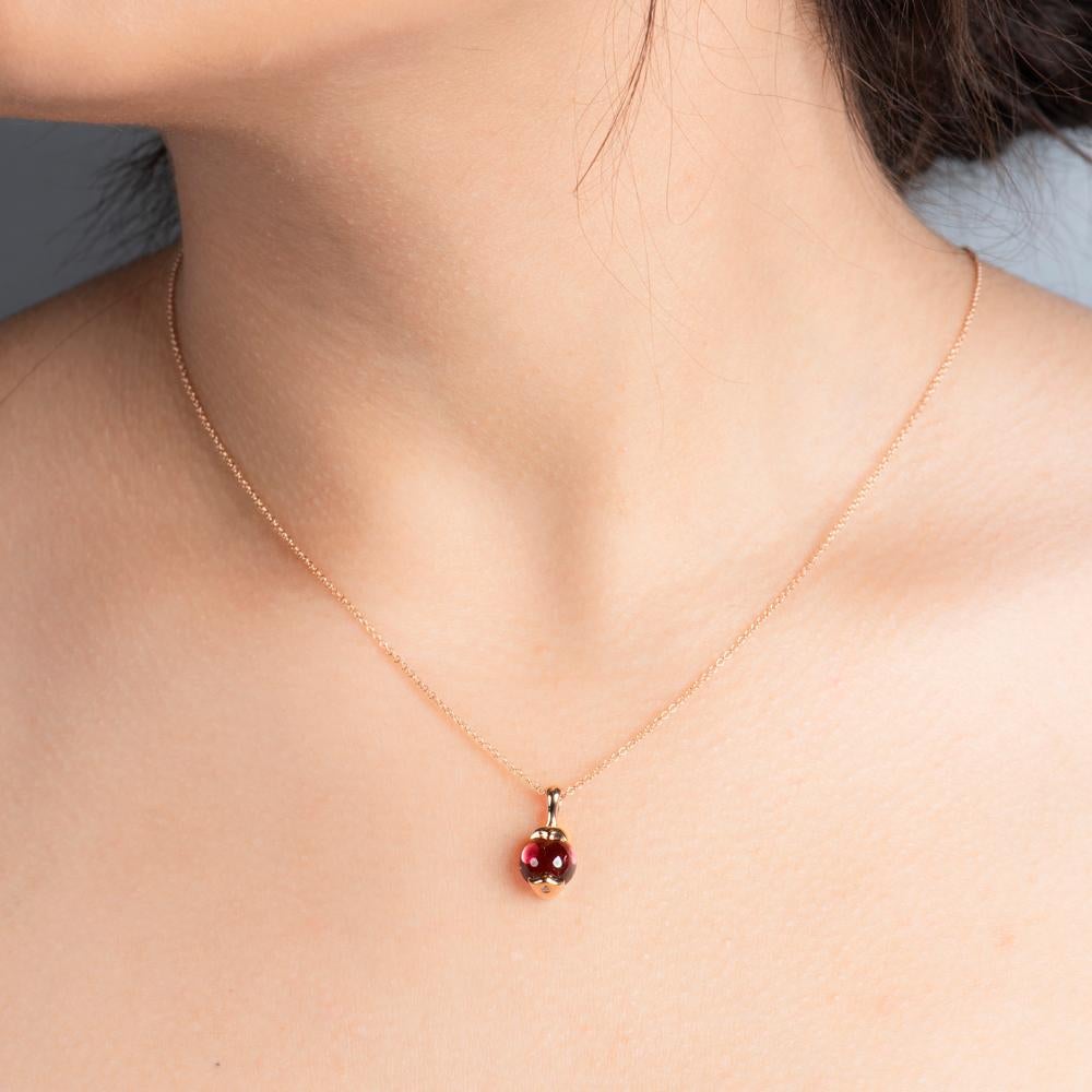 
Beautifully dainty and wildly ornate, this lavish pendant is perfect for adding feminine flourishes to any outfit.

Featuring a flawlessly cut 2.10 Carat Rubellite as the integral part of the pendant, the gem is set into an 18K rose gold bail with