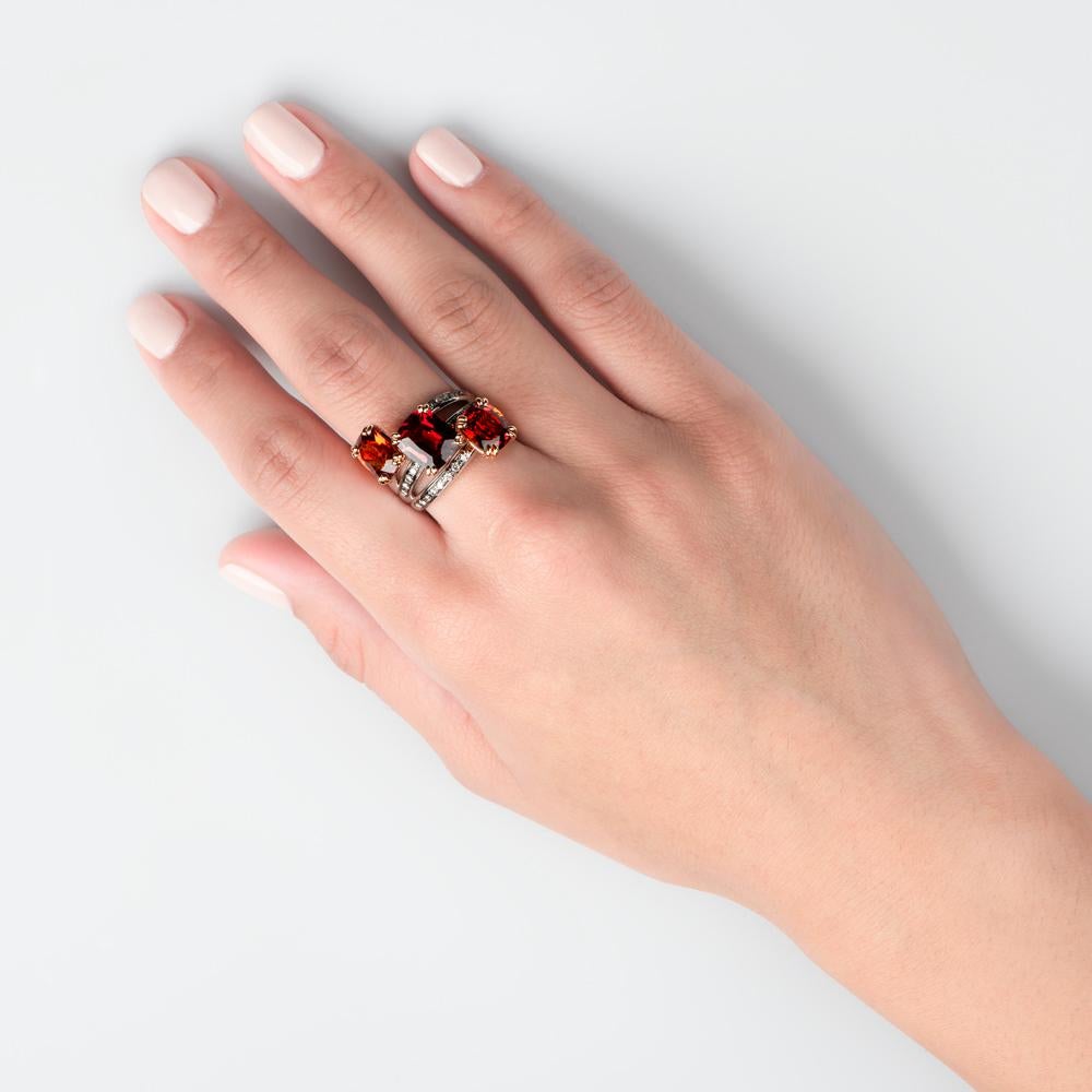 Called the ‘Harvest’ ring due to the unique and spellbinding autumnal hue of the central stone, this Zorab Creations ring is the perfect gift for a loved one who idolizes the finer things in life.

Featuring 3 separate Spessartite Garnet gems,