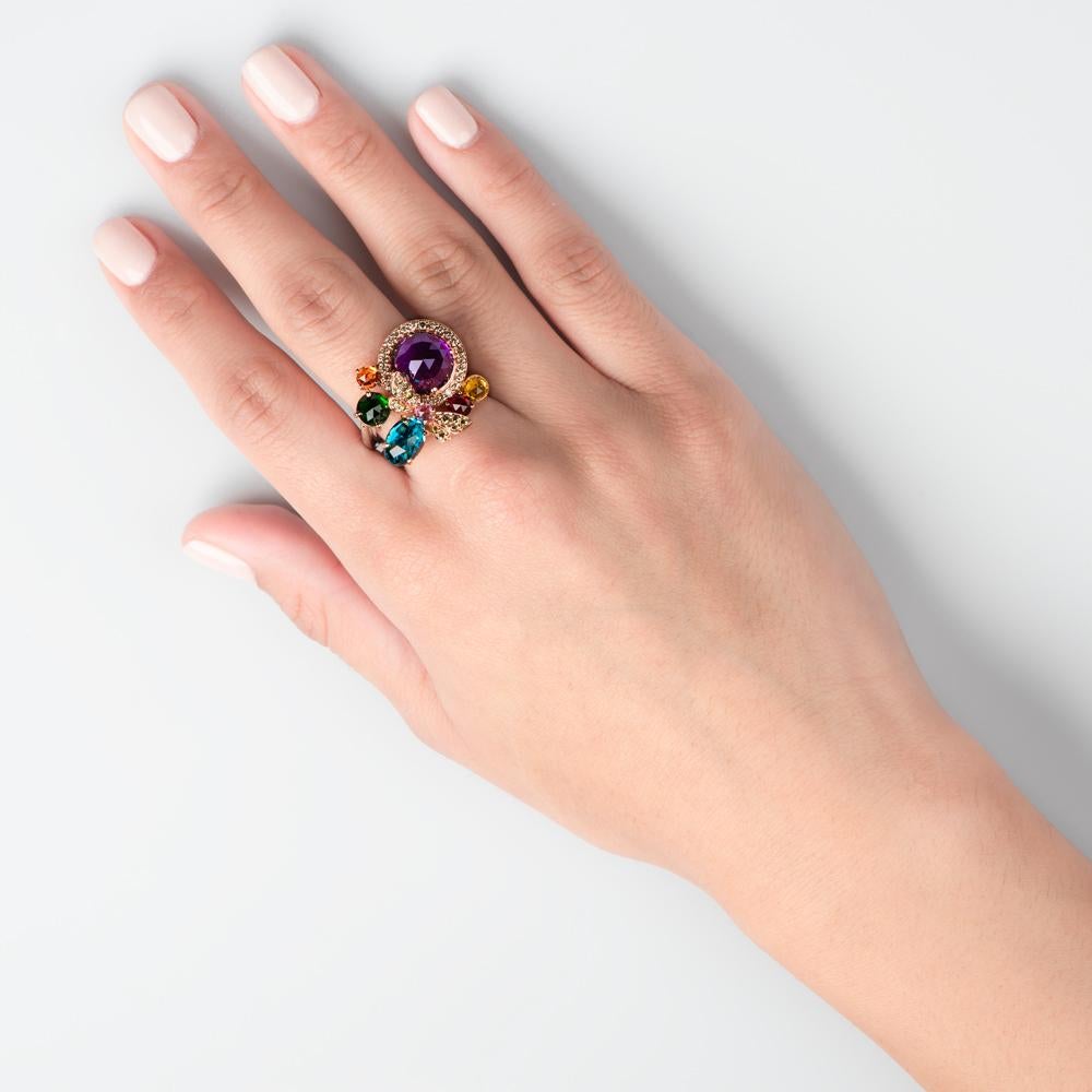 A splendid spectrum of color awaits your hand with the Precious Kaleidoscope ring, a Zorab Creation.

Mesmerizing in its brilliantly light catching tones, yellow diamonds 0.26 carats meet yellow sapphires 0.37 carats and glowing amethysts 4.30