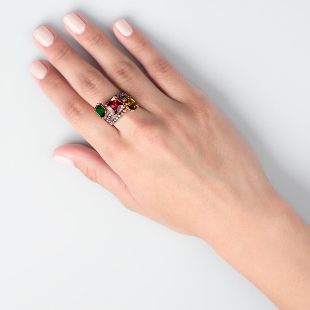 If your love of tourmalines knows no bounds, then this ring was designed especially to tug at your heart strings. With an elaborate and coveted mix of three different colored gems, you are certain to be the envy of all.
This gold ring features a